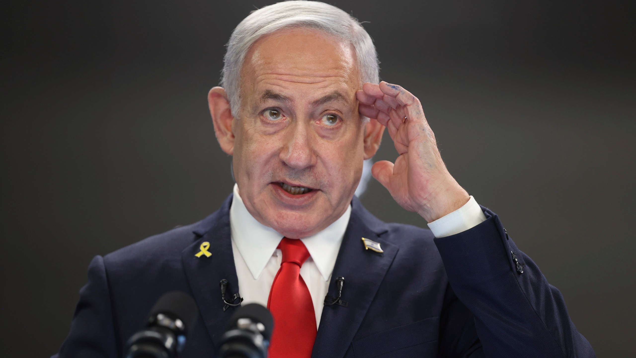Israeli Prime Minister Benjamin Netanyahu speaks during a press conference at the Prime minister's office in Jerusalem, Sunday, Aug. 10, 2025. (Abir Sultan/Pool Photo via AP)