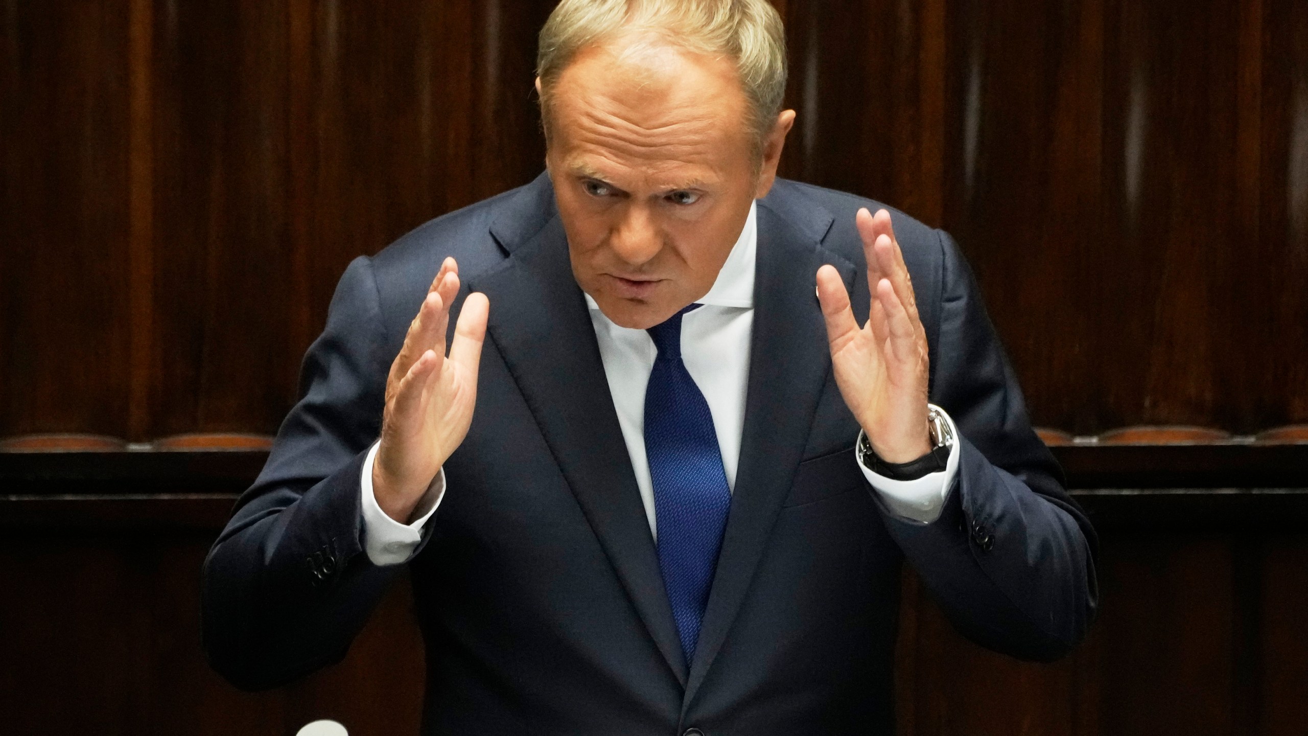 FILE - Poland's Prime Minister Donald Tusk addresses the Polish parliament on Wednesday, June 11, 2025, in Warsaw, Poland. (AP Photo/Czarek Sokolowski, File)