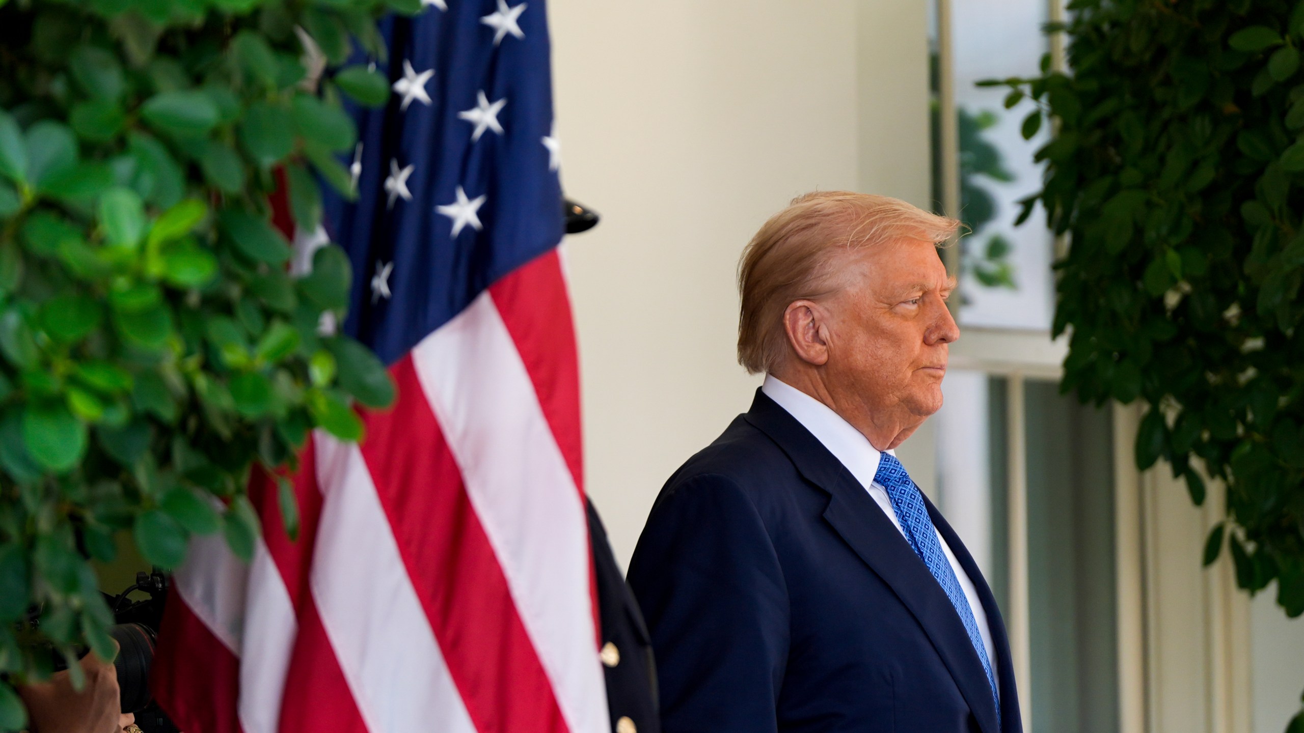President Donald Trump waits to greet Armenia's Prime Minister Nikol Pashinyan at the White House, Friday, Aug. 8, 2025, in Washington. (AP Photo/Julia Demaree Nikhinson)