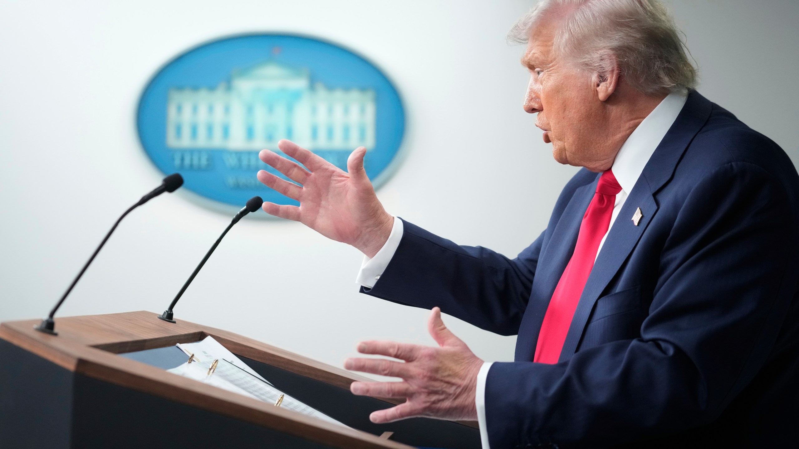 President Donald Trump speaks with reporters in the James Brady Press Briefing Room at the White House, Monday, Aug. 11, 2025, in Washington. (AP Photo/Mark Schiefelbein)