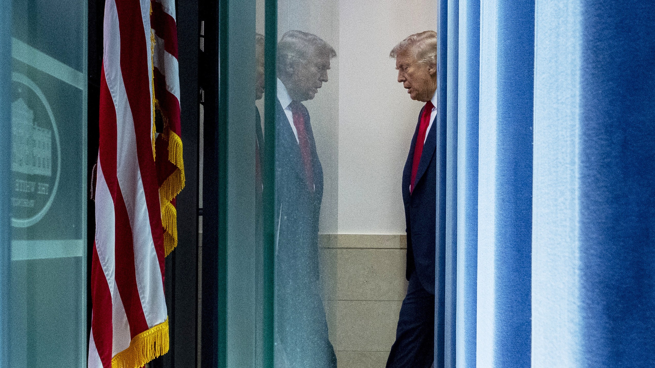 President Donald Trump arrives to speak with reporters in the James Brady Press Briefing Room at the White House, Monday, Aug. 11, 2025, in Washington. (AP Photo/Alex Brandon)