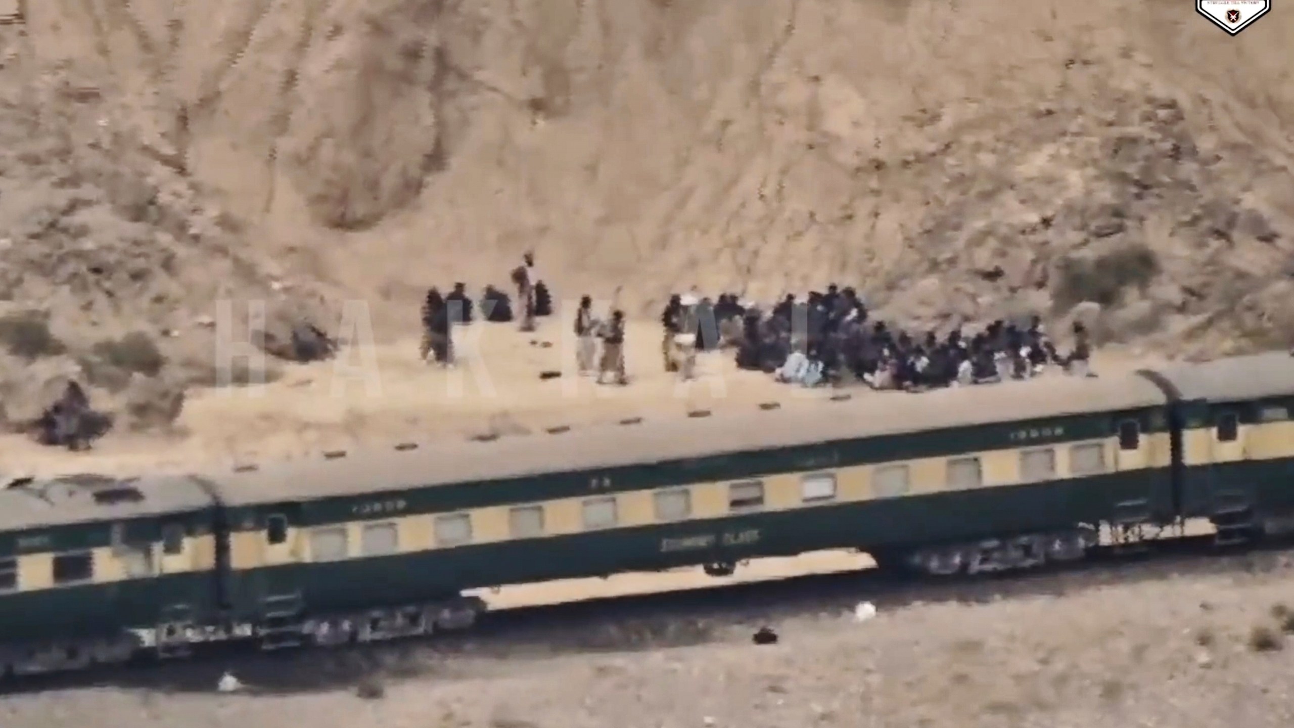 people outside a train after being attacked by the BLA