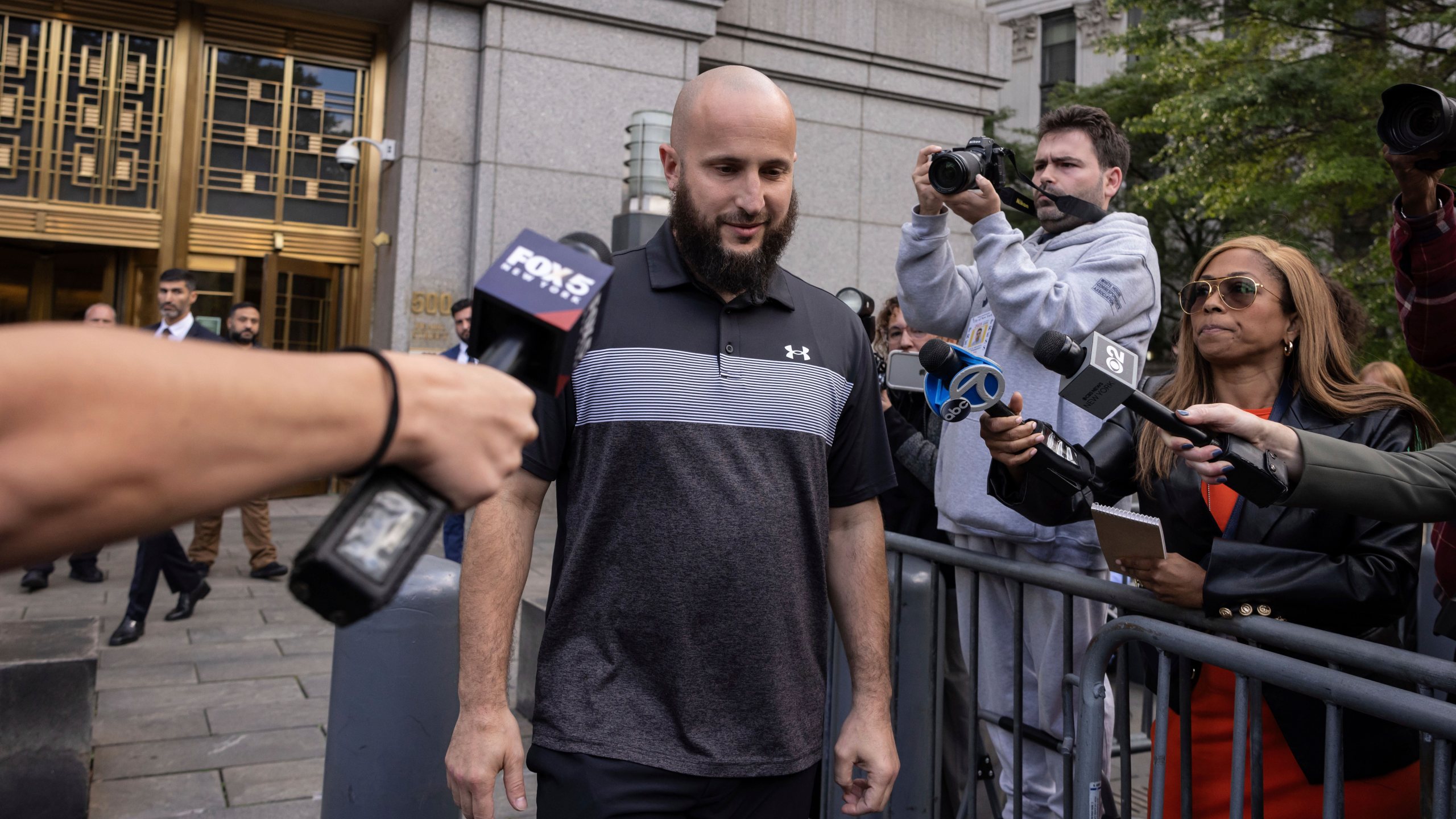 FILE - Mohamed Bahi, New York City Mayor's liaison to the Muslim community exits Manhattan Federal Court, Oct. 8, 2024, in New York. (AP Photo/Yuki Iwamura, File)