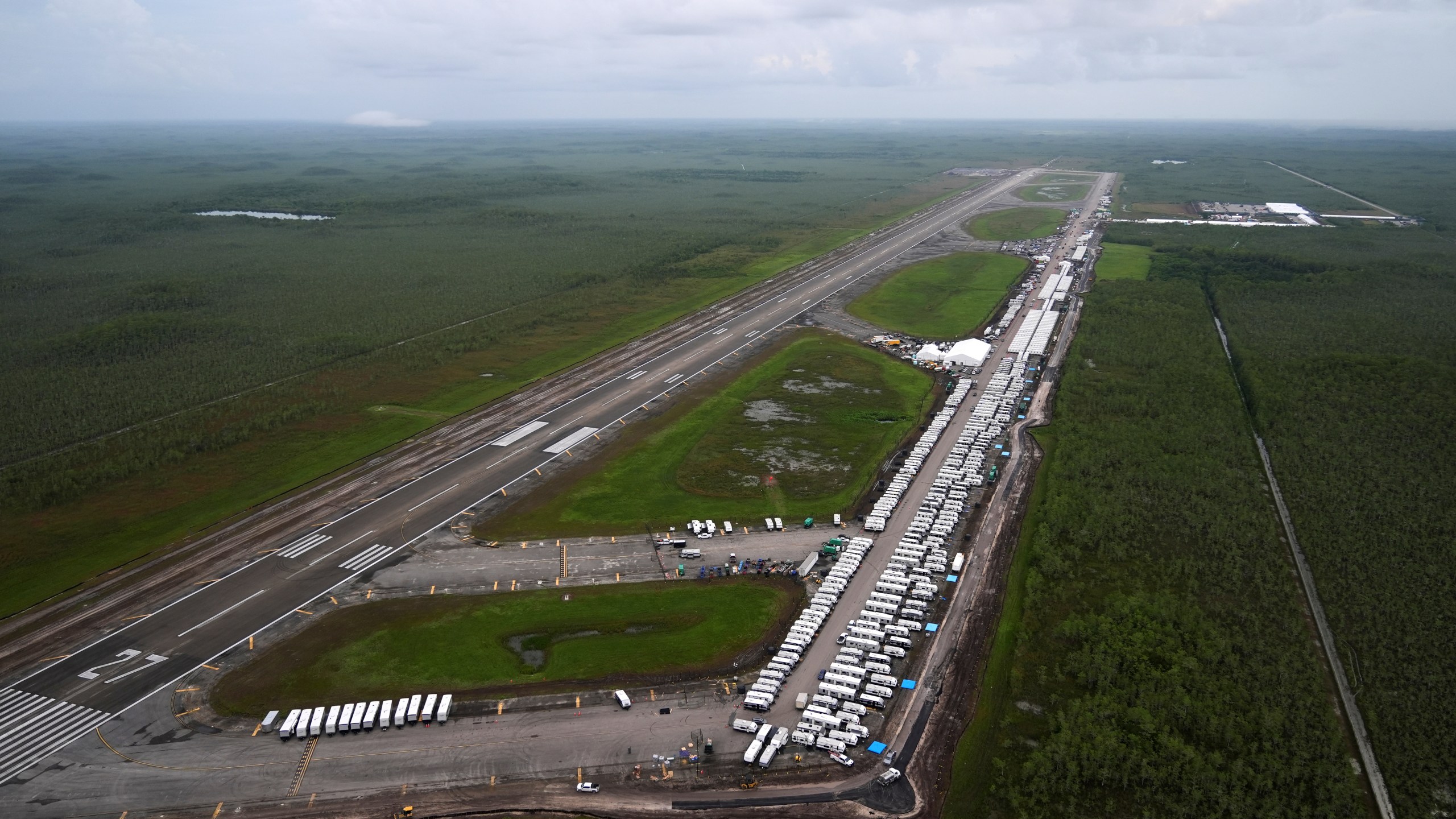 FILE - Work progresses on the Dade-Collier Training and Transition facility in the Florida Everglades, July 4, 2025, in Ochopee, Fla. (AP Photo/Rebecca Blackwell, file)