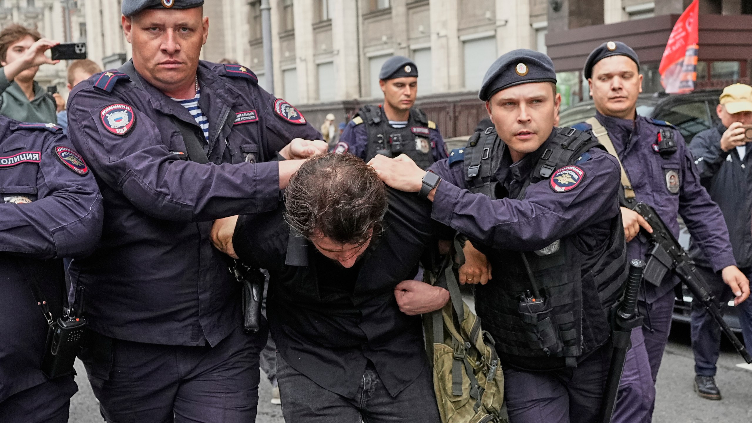 FILE - Police detain an activist protesting a bill that punishes online searches for information that is deemed “extremist” outside the State Duma, the lower house of parliament, in Moscow, Russia, July 22, 2025. (AP Photo, File)