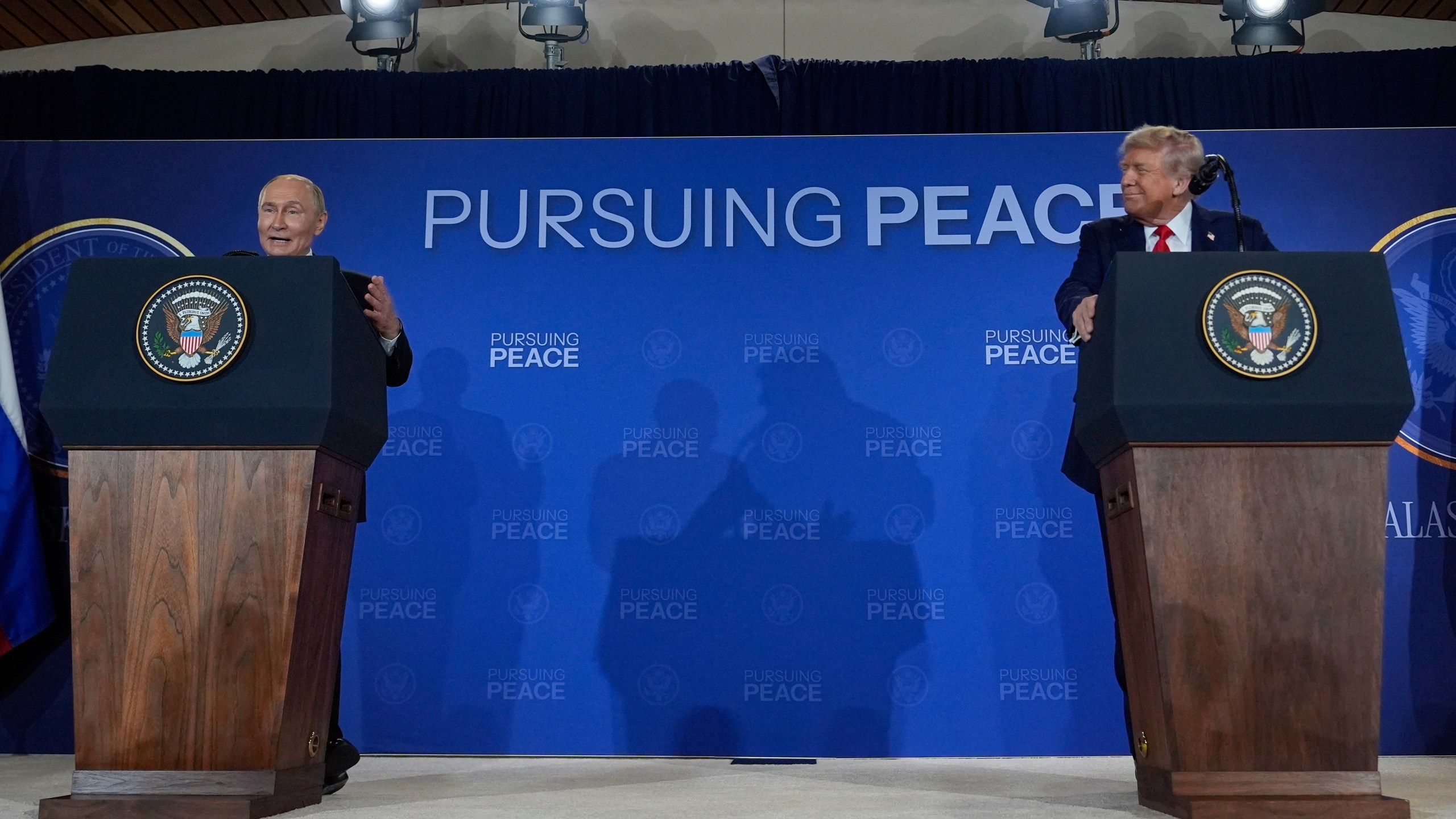 President Donald Trump and Russia's President Vladimir Putin speak during a news conference at Joint Base Elmendorf-Richardson, Alaska, Friday, Aug. 15, 2025. (AP Photo/Julia Demaree Nikhinson)