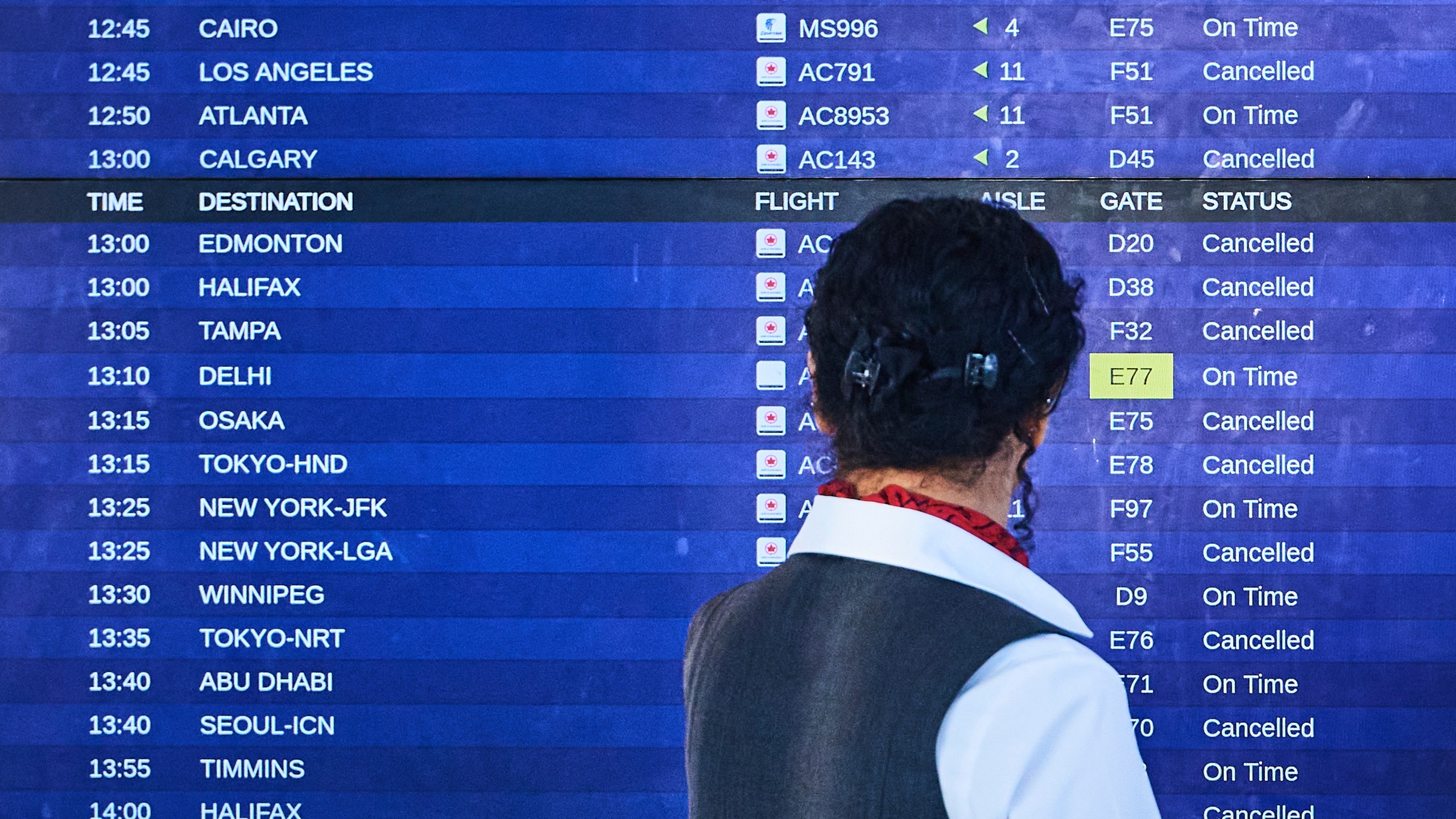 Air Canada flights show as cancelled at Pearson International Airport as flight attendants go on strike in Toronto on Saturday, Aug. 16, 2025. (Sammy Kogan/The Canadian Press via AP)