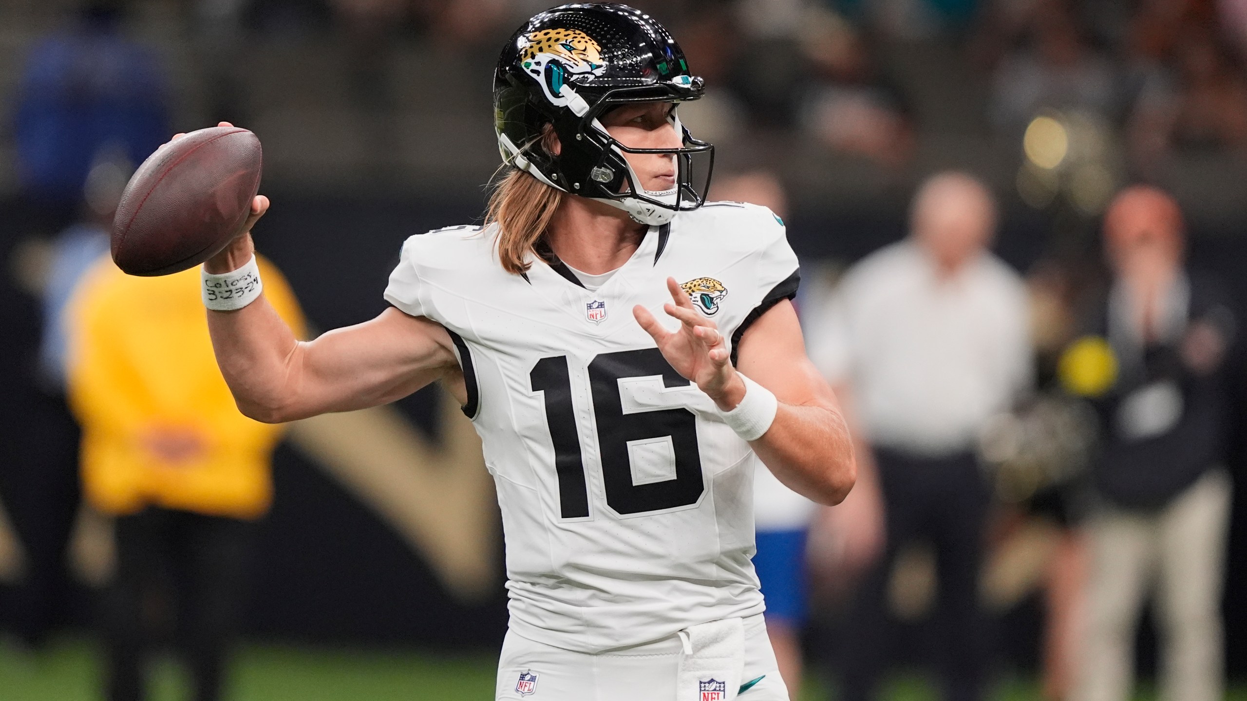 Jacksonville Jaguars quarterback Trevor Lawrence throws a pass against the New Orleans Saints in the first half of an NFL preseason football game in New Orleans, Sunday, Aug. 17, 2025. (AP Photo/Gerald Herbert)