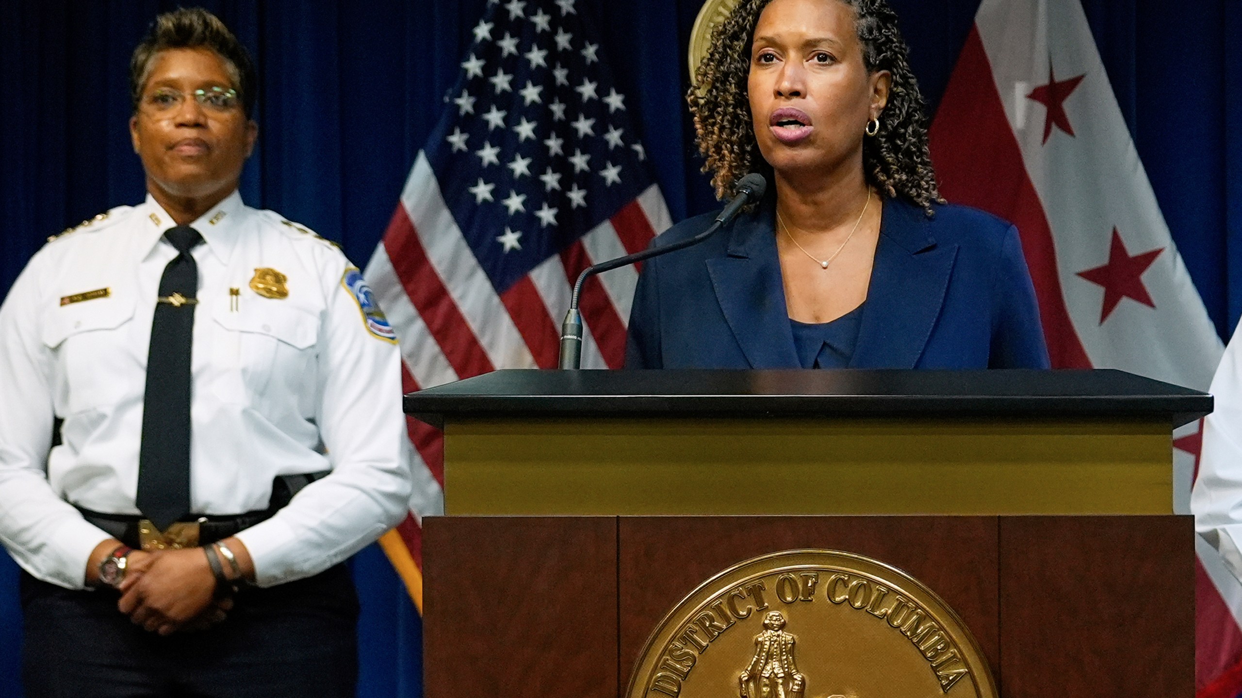 FILE - Washington Mayor Muriel Bowser speaks, accompanied by Metropolitan Police Department Chief Pamela A. Smith, during a news conference on President Donald Trump's plan to place Washington police under federal control and deploy National Guard troops to Washington, Monday, Aug. 11, 2025, in Washington. (AP Photo/Julia Demaree Nikhinson, File)