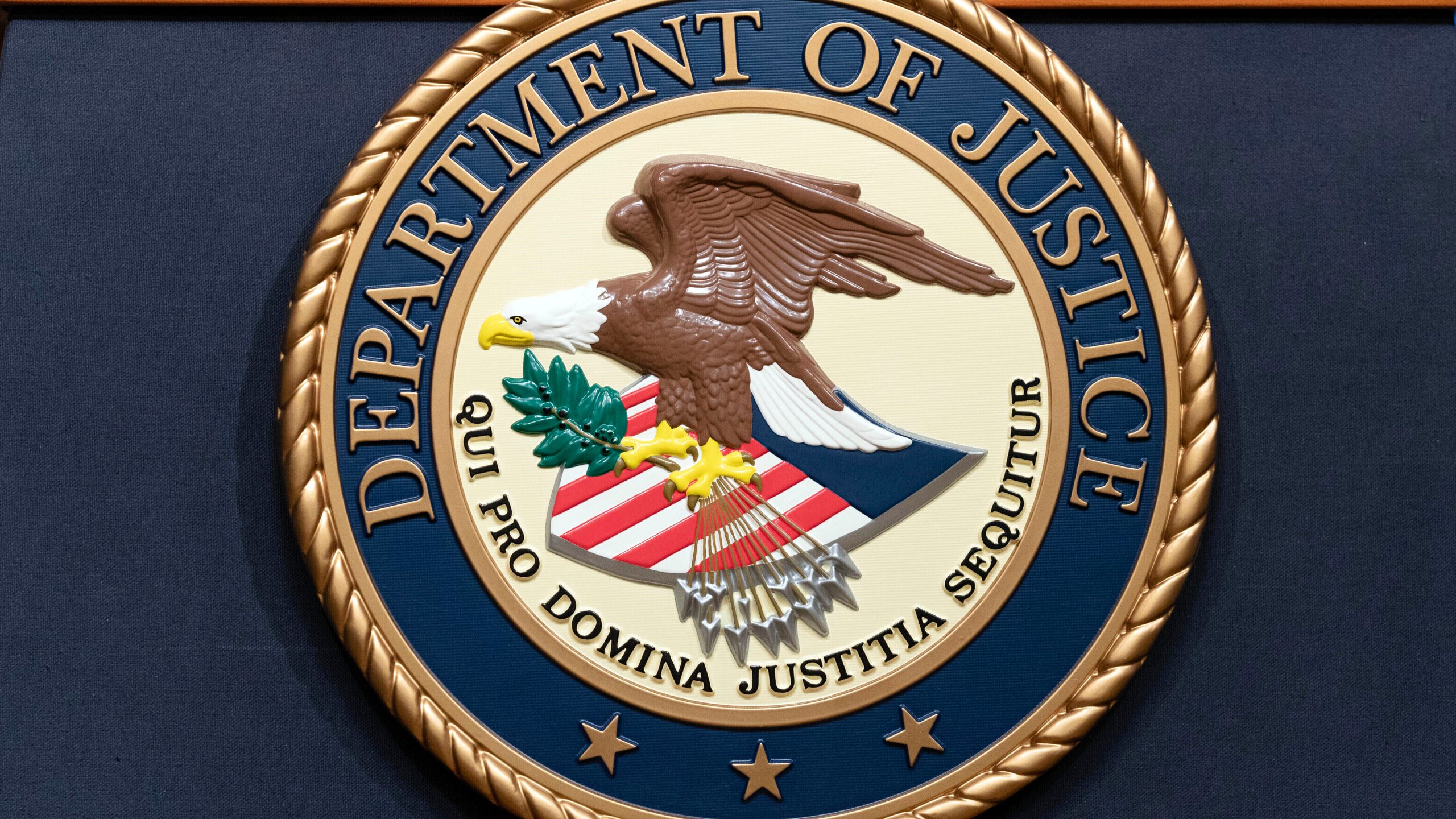 FILE - The Department of Justice seal is seen during a news conference at the DOJ office in Washington, May 16, 2023. (AP Photo/Jose Luis Magana, File)