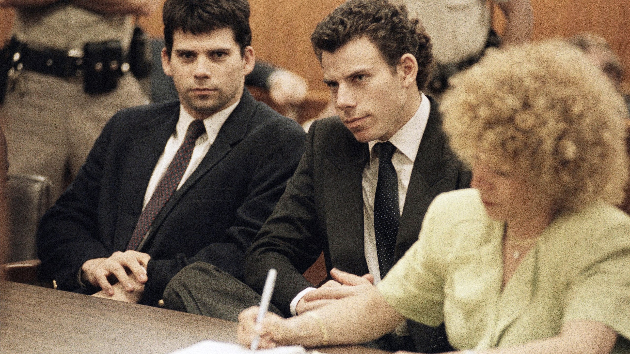 FILE - Lyle, left, and Erik Galen Menendez sit in a Beverly Hills, Calif., courtroom, May 14, 1990. (AP Photo/Kevork Djansezian, File)