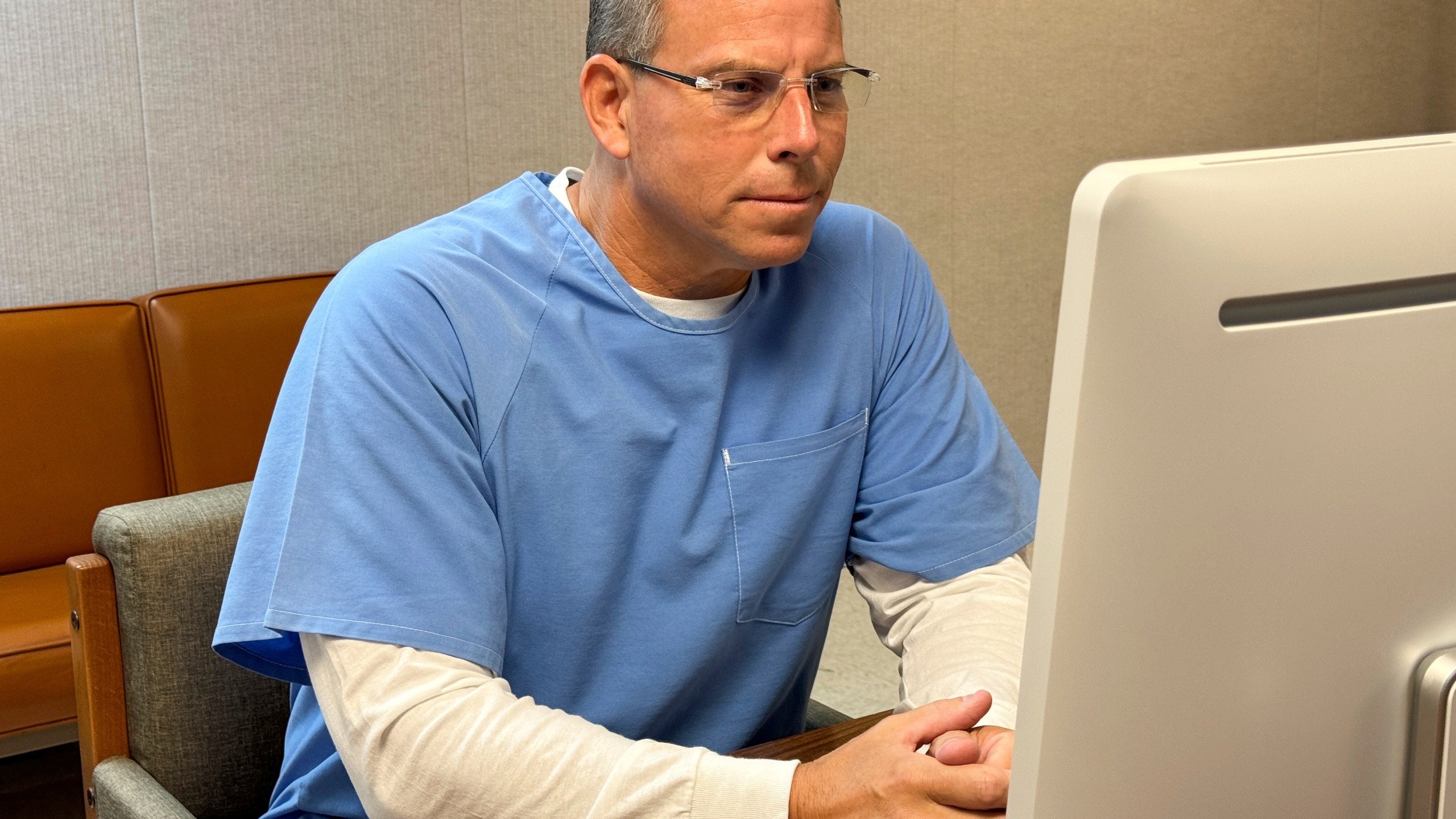 Erik Menendez appears before the parole board via teleconference on Thursday, Aug. 21, 2025, at the Richard J. Donovan Correctional Facility in San Diego. (California Department of Corrections via AP)