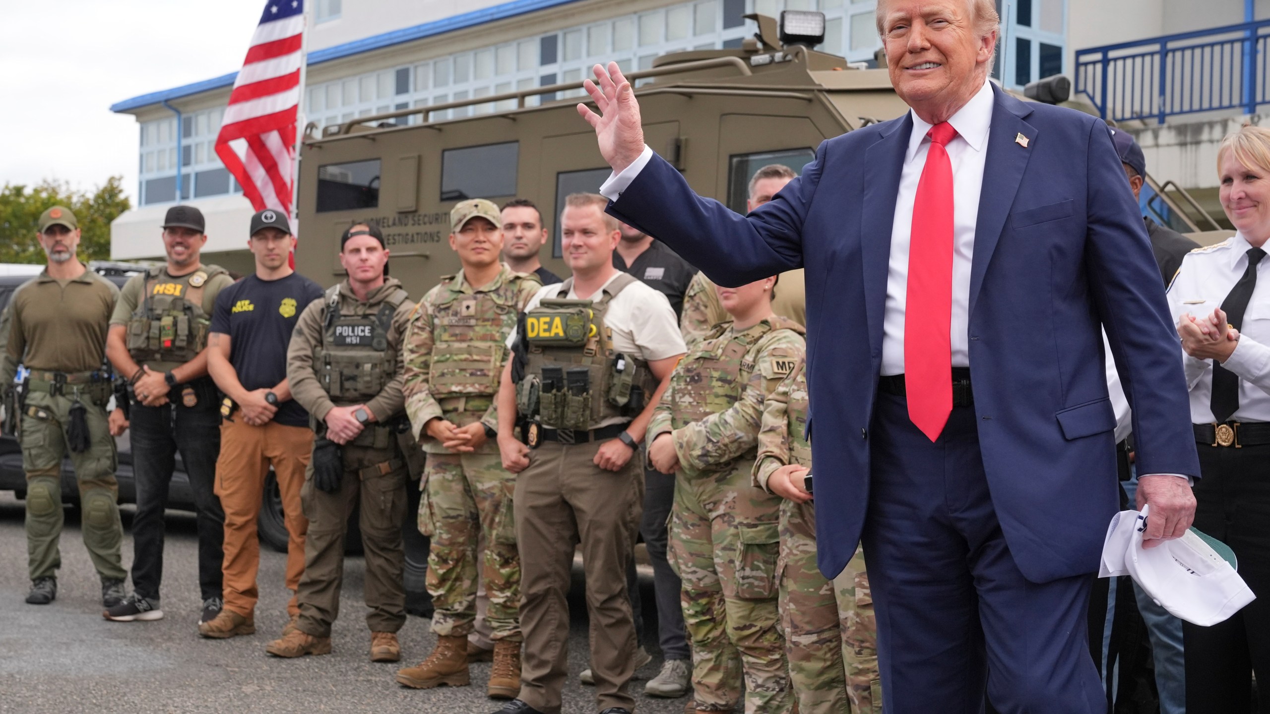 President Donald Trump speaks with members of law enforcement and National Guard soldiers, Thursday, Aug. 21, 2025, in Washington. (AP Photo/Jacquelyn Martin)