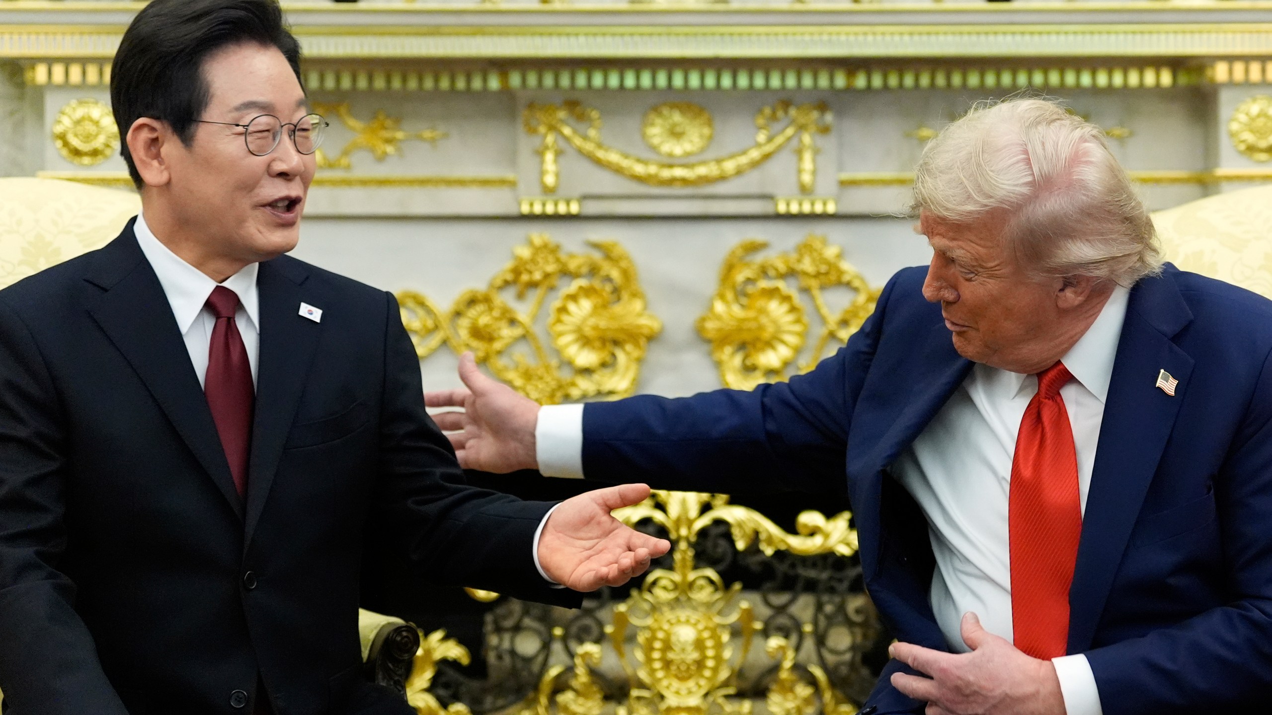 President Donald Trump, right, meets with South Korean President Lee Jae Myung in the Oval Office of the White House, Monday, Aug. 25, 2025, in Washington. (AP Photo/Alex Brandon)