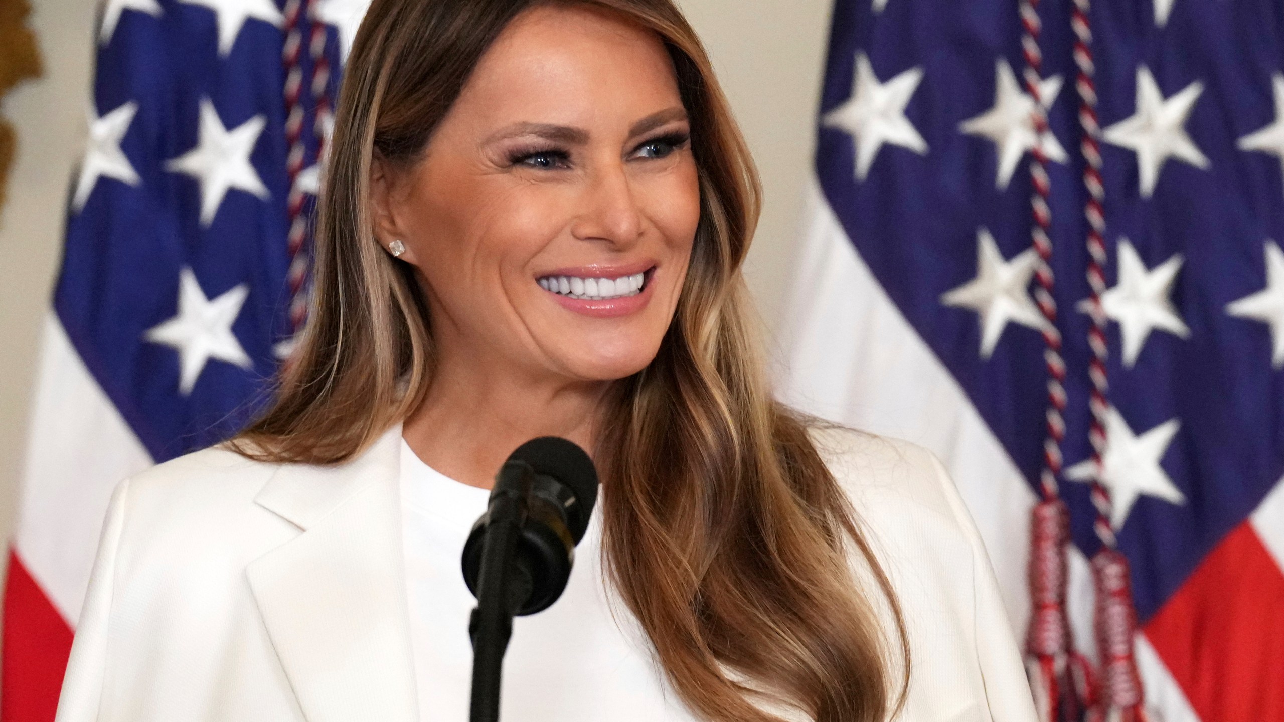 FILE - First lady Melania Trump speaks during an event unveiling a U.S. Postal Service Stamp honoring former first lady Barbara Bush, May 8, 2025, in the East Room of the White House in Washington. (AP Photo/Jacquelyn Martin, FIle)