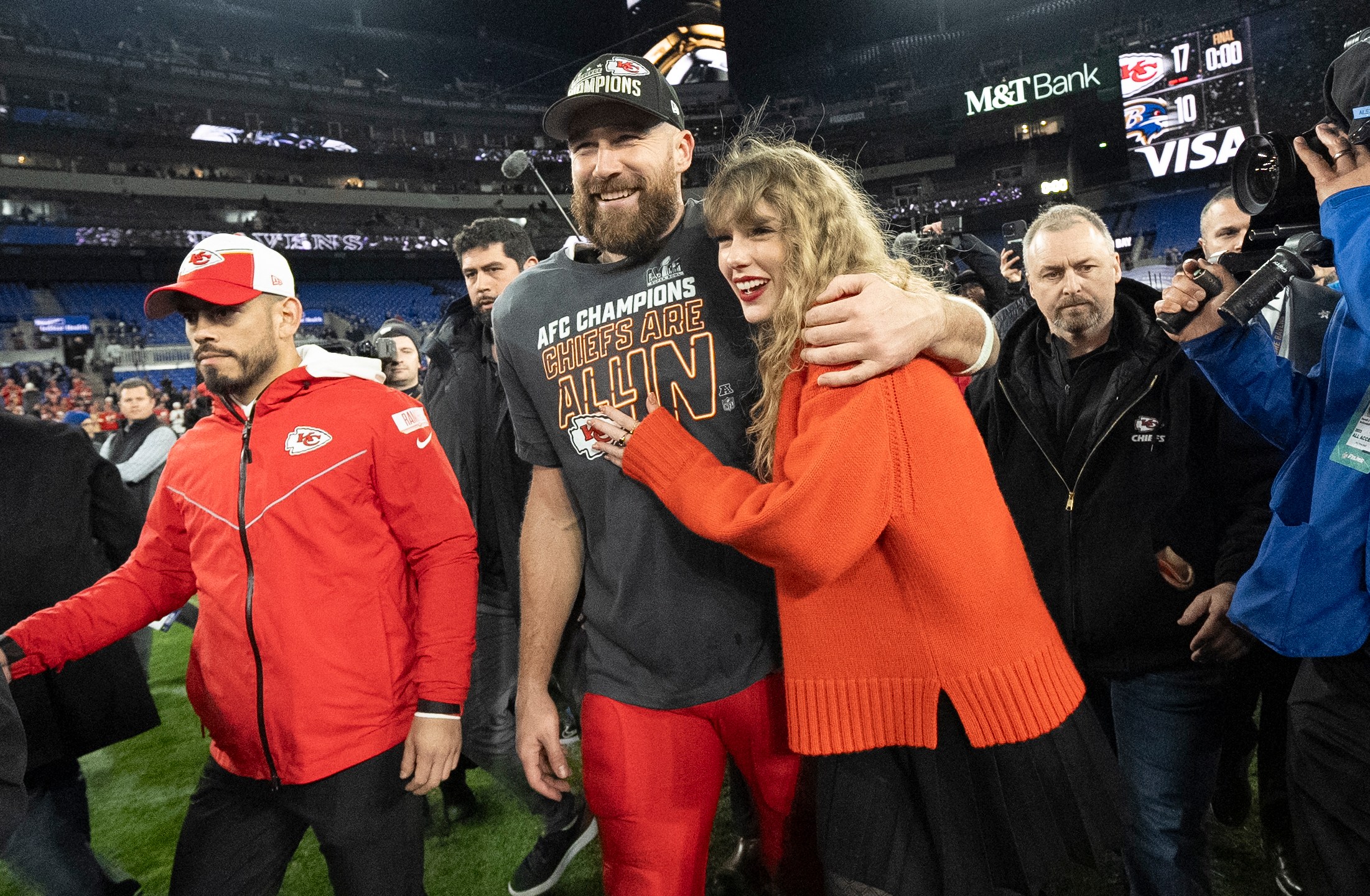 FILE - Kansas City Chiefs tight end Travis Kelce and Taylor Swift walk together after an AFC Championship NFL football game between the Chiefs and the Baltimore Ravens, Jan. 28, 2024, in Baltimore. (AP Photo/Julio Cortez, File)