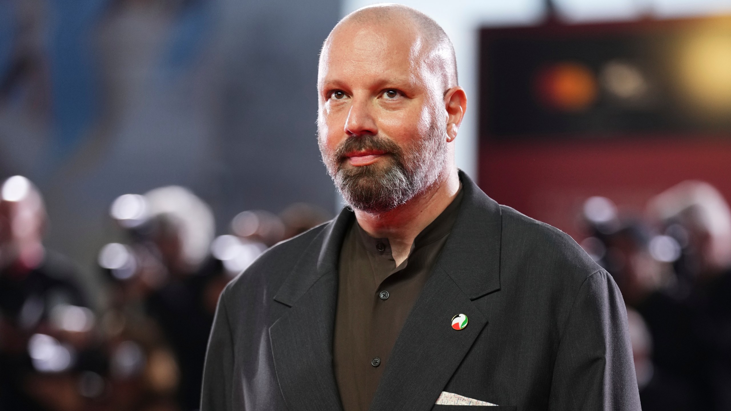 Director Yorgos Lanthimos poses for photographers on the red carpet for the film 'Bugonia' during the 82nd edition of the Venice Film Festival in Venice, Italy, on Thursday, Aug. 28, 2025. (Photo by Scott A Garfitt/Invision/AP)