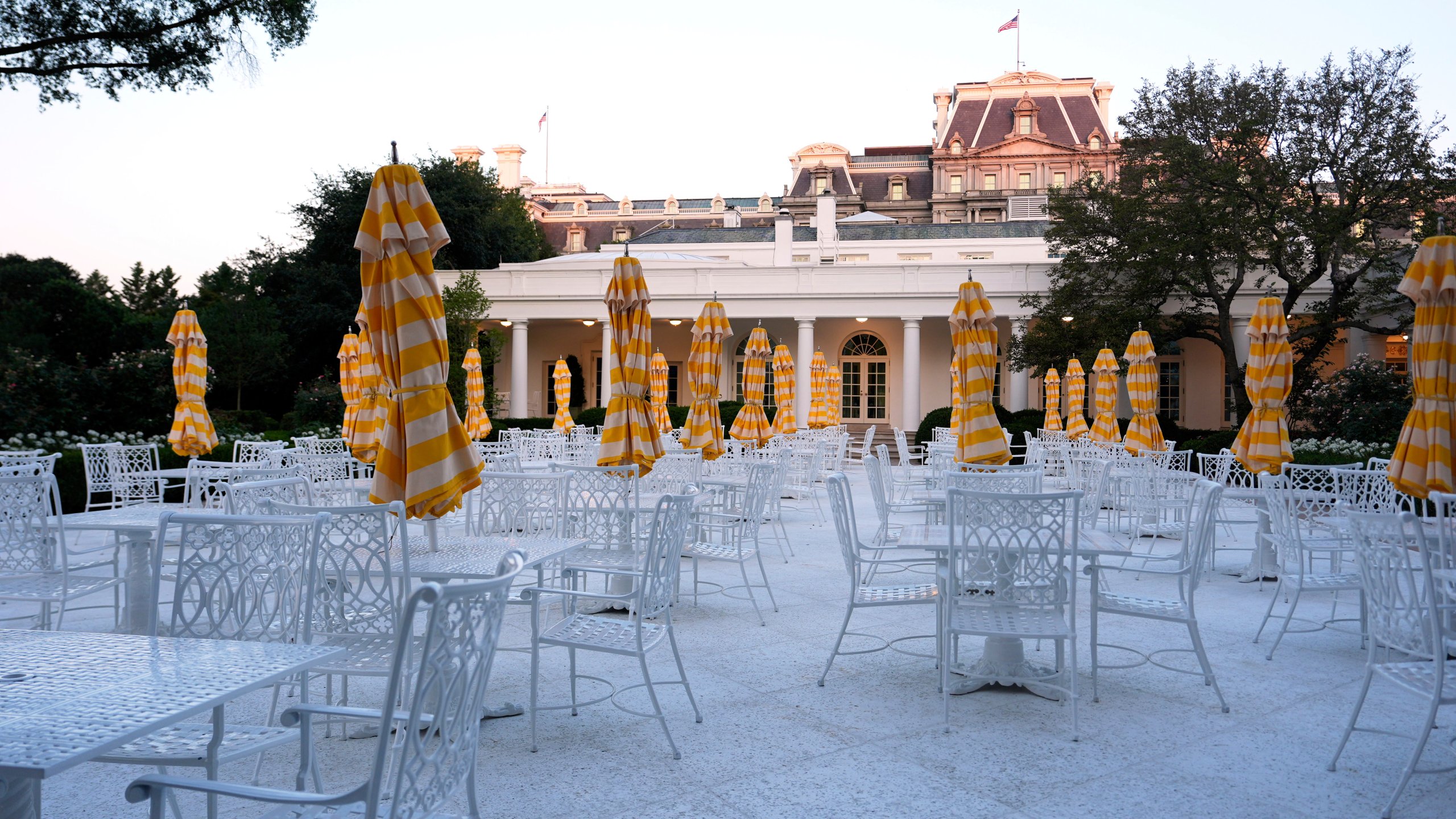 Tables and chairs stand in the newly renovated Rose Garden