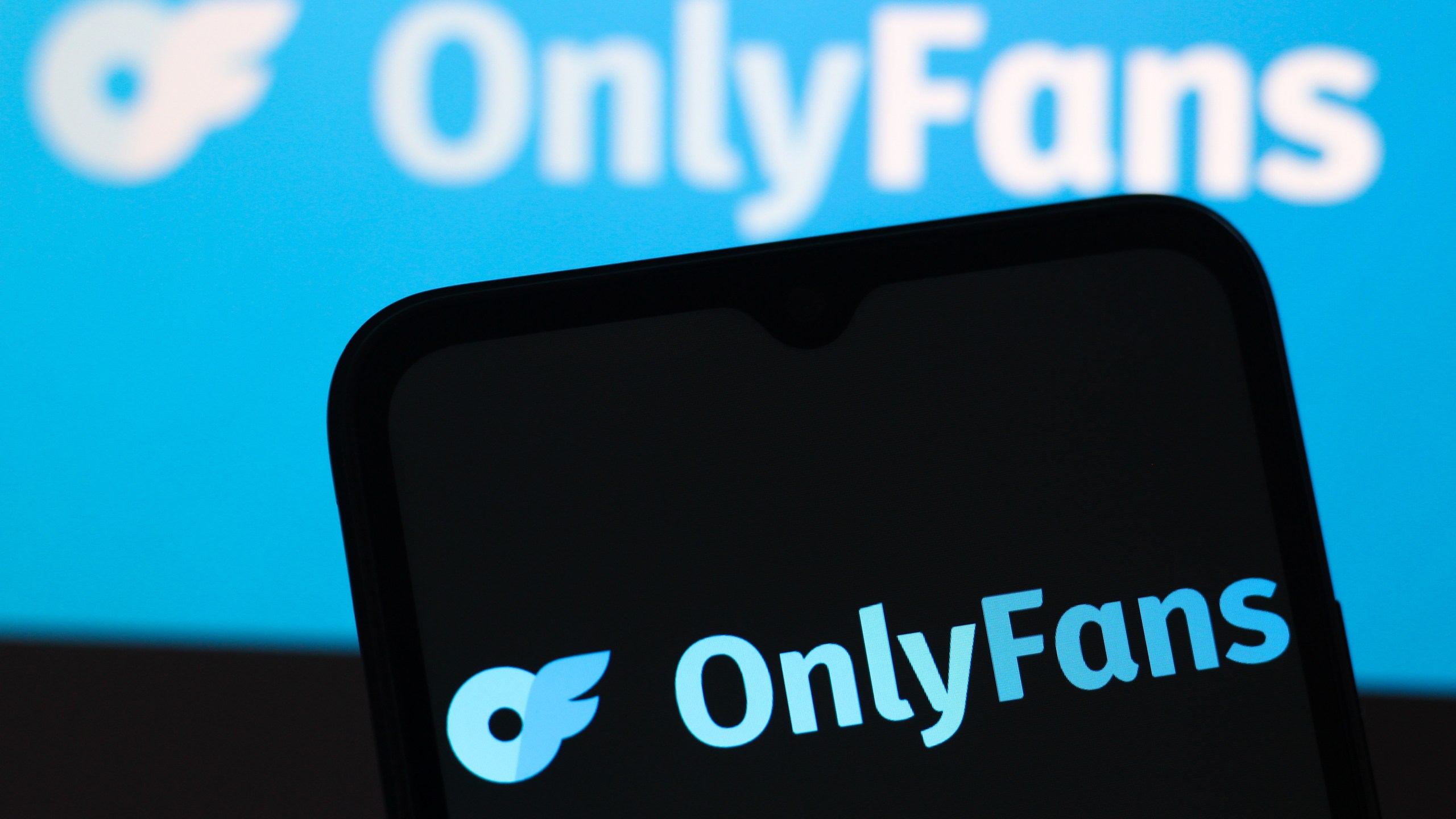 In this photo illustration, the OnlyFans (Only Fans) logo is seen displayed on a smartphone screen.