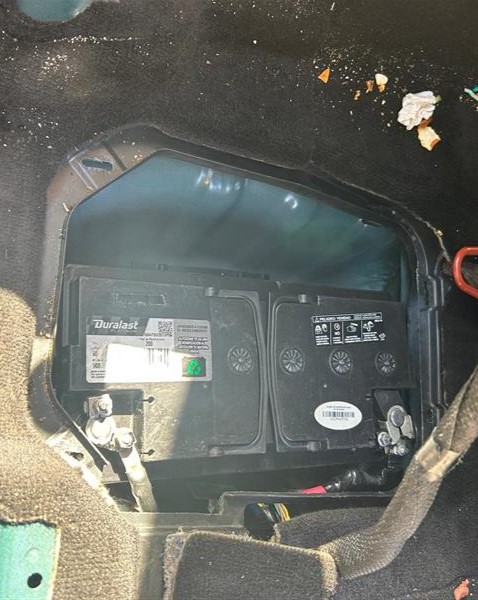 Inside of a car where drugs were being held in the battery