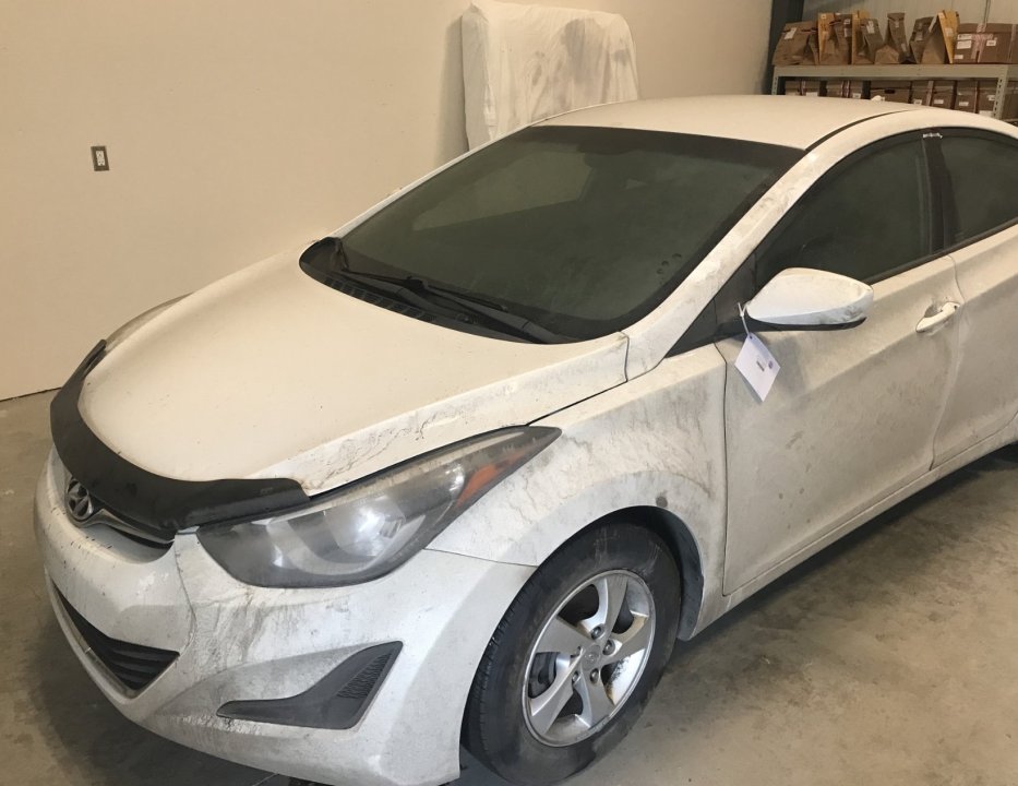 Photos of Bryan Kohberger's white Hyundai Elantra after processing in Pennsylvania (courtesy Idaho State Police)