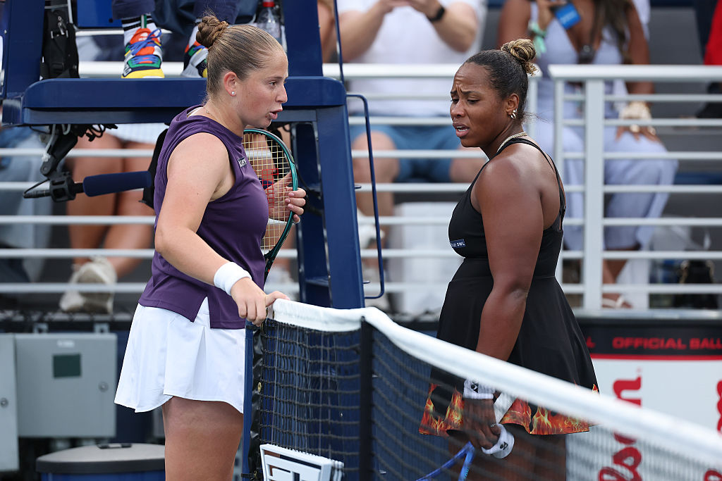 Taylor Townsend greets Jelena Ostapenko
