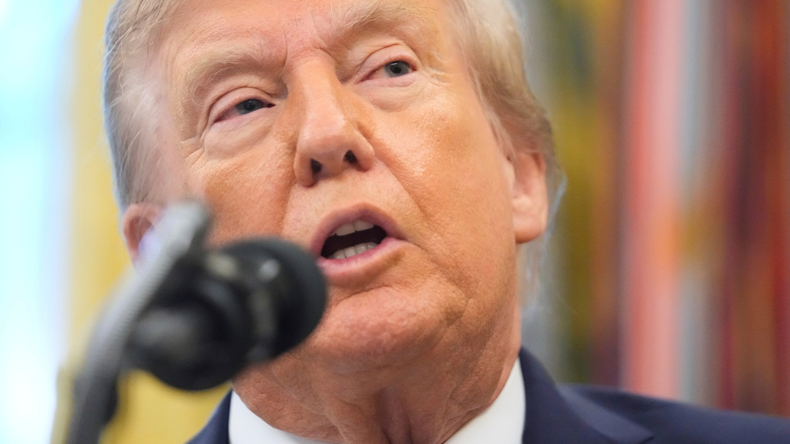 President Donald Trump speaks during an event about the relocation of U.S. Space Command headquarters from Colorado to Alabama in the Oval Office of the White House, Tuesday, Sept. 2, 2025, in Washington. (AP Photo/Mark Schiefelbein)