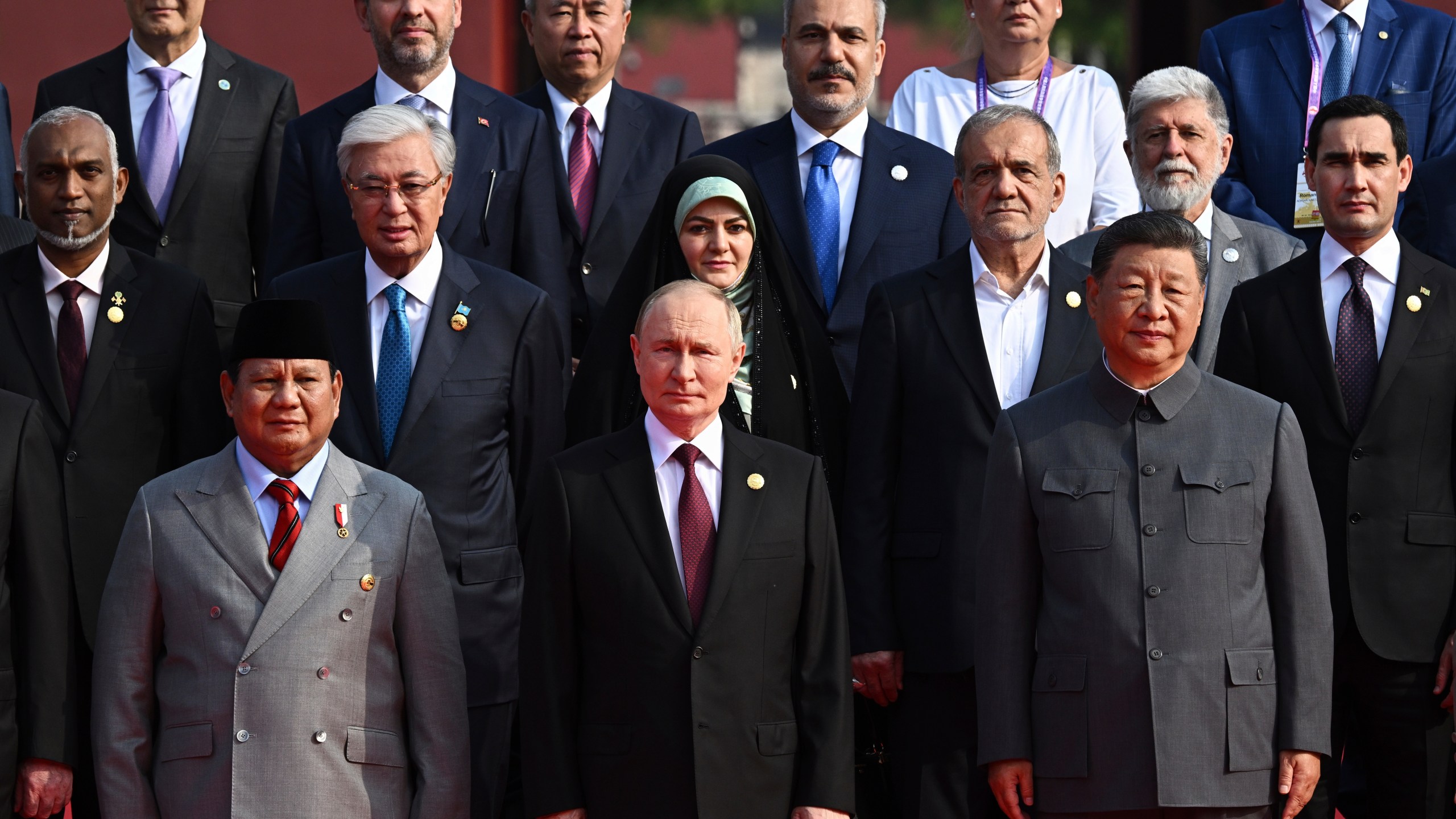 Front from left, Indonesian President Prabowo Subianto, Russian President Vladimir Putin and Chinese President Xi Jinping pose for a group photo ahead of a military parade to commemorate the 80th anniversary of Japan's World War II surrender held in front of Tiananmen Gate in Beijing, China, Wednesday, Sept. 3, 2025. (Sergei Bobylev, Sputnik, Kremlin Pool Photo via AP)