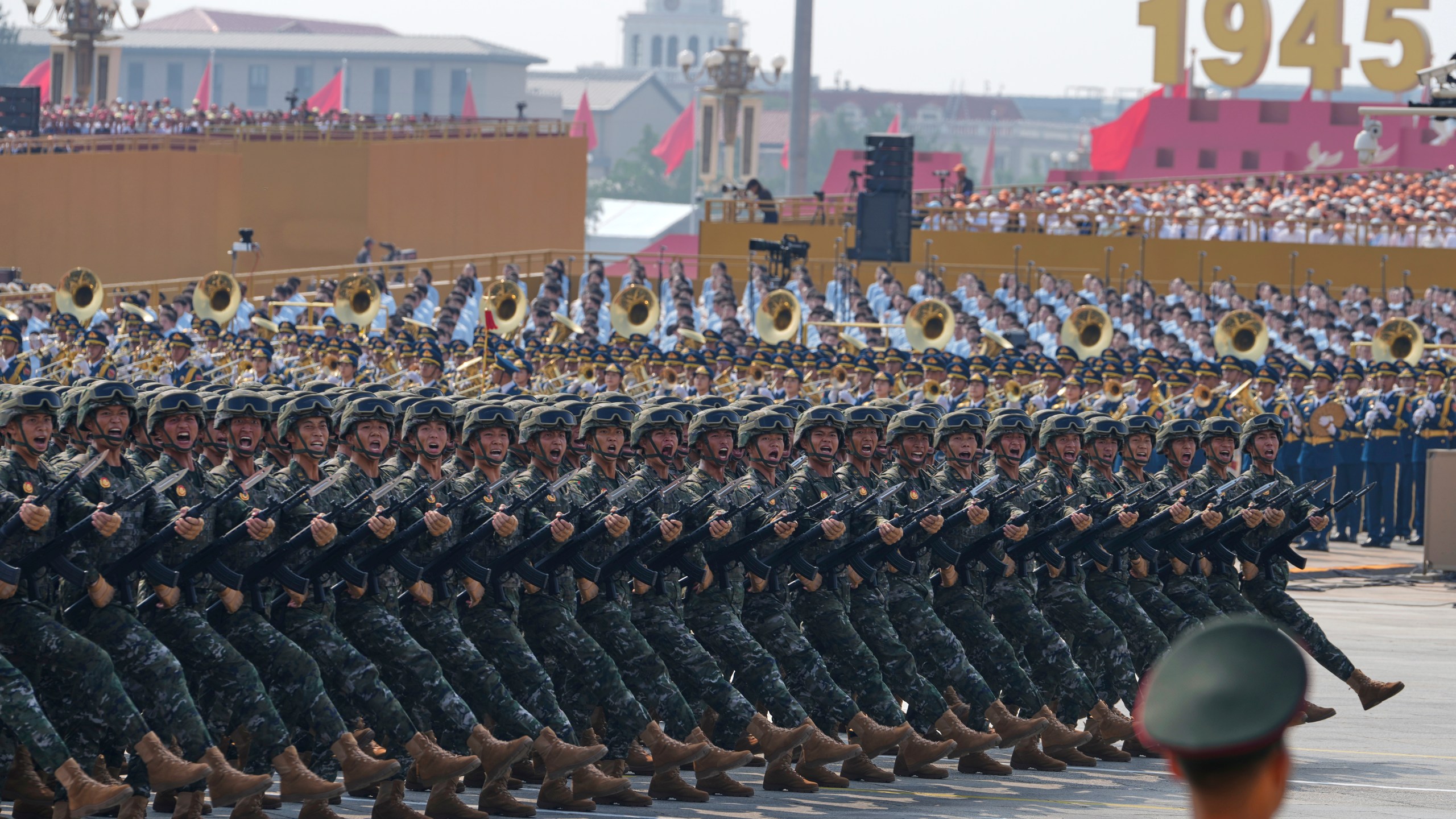 Military personnel take part in a military parade to commemorate the 80th anniversary of Japan's World War II surrender held in front of Tiananmen Gate in Beijing, Wednesday, Sept. 3, 2025. (AP Photo/Ng Han Guan)