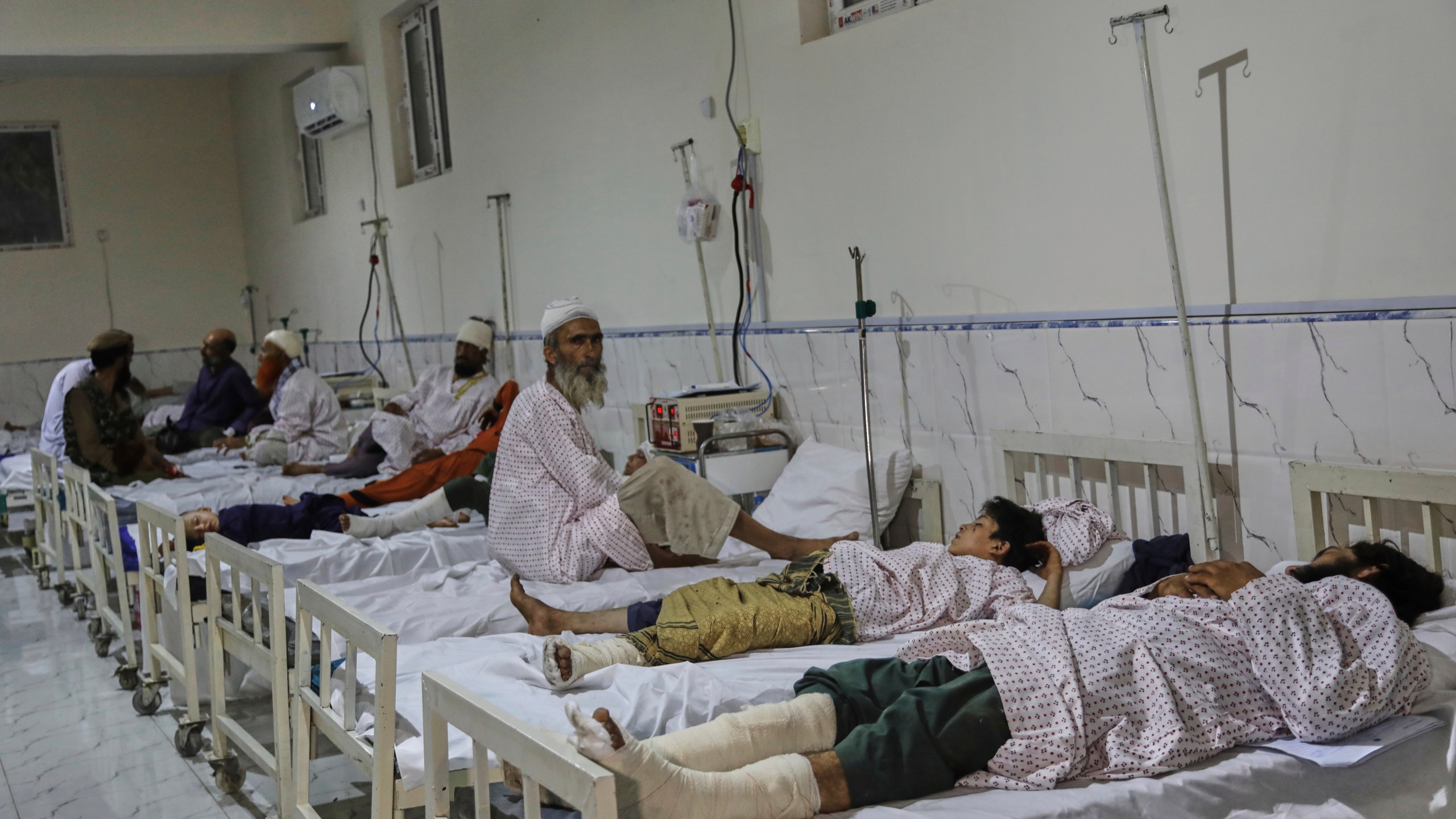 Afghans injured in a powerful earthquake that struck eastern Afghanistan on Sunday, lie on beds at Nangarhar Regional Hospital in Jalalabad, Afghanistan, Wednesday, Sept. 3, 2025. (AP Photo/Siddiqullah Alizai)