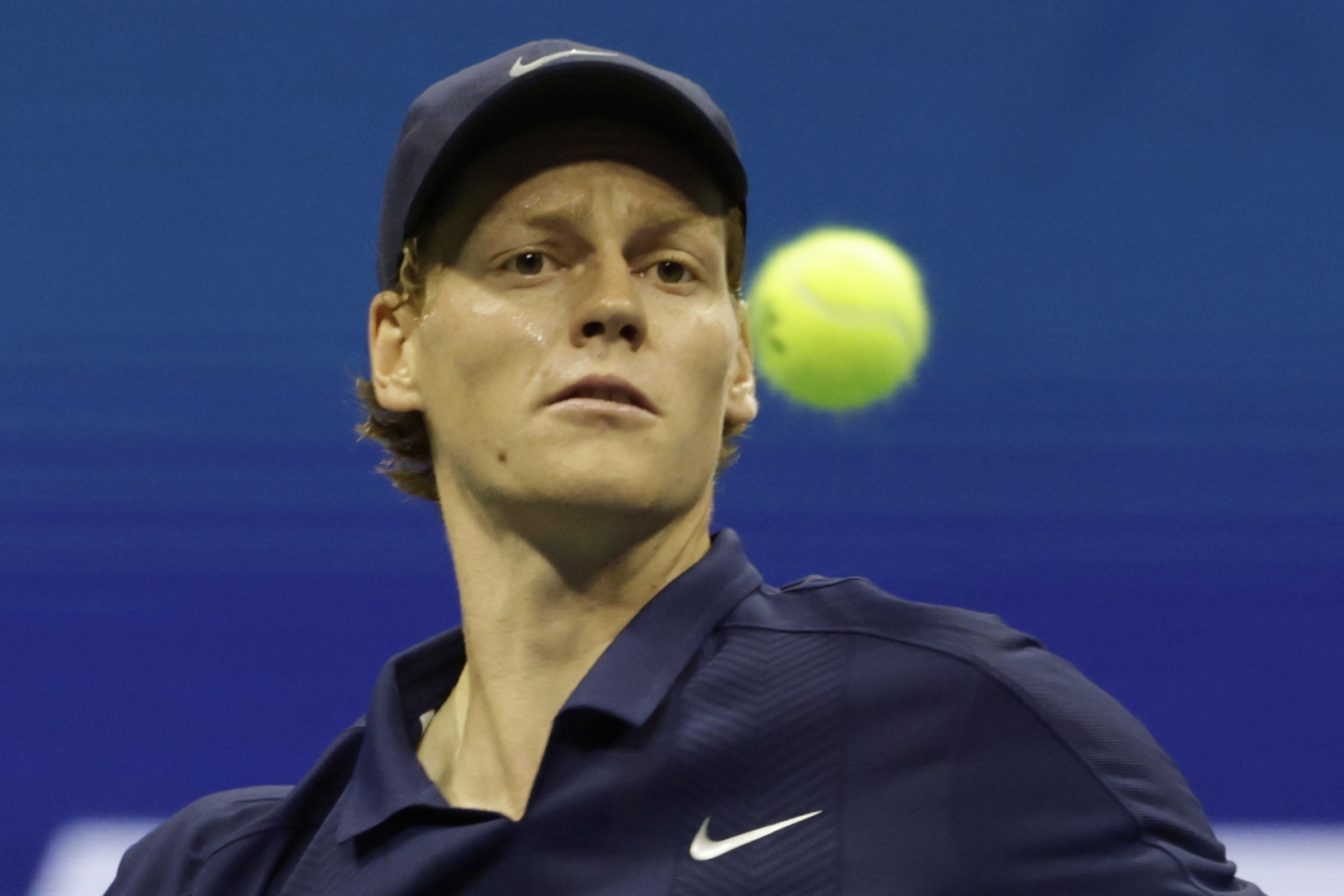 Jannik Sinner, of Italy, returns a shot to Lorenzo Musetti, of Italy, during the quarterfinal round of the U.S. Open tennis championships, Wednesday, Sept. 3, 2025, in New York. (AP Photo/Adam Hunger)