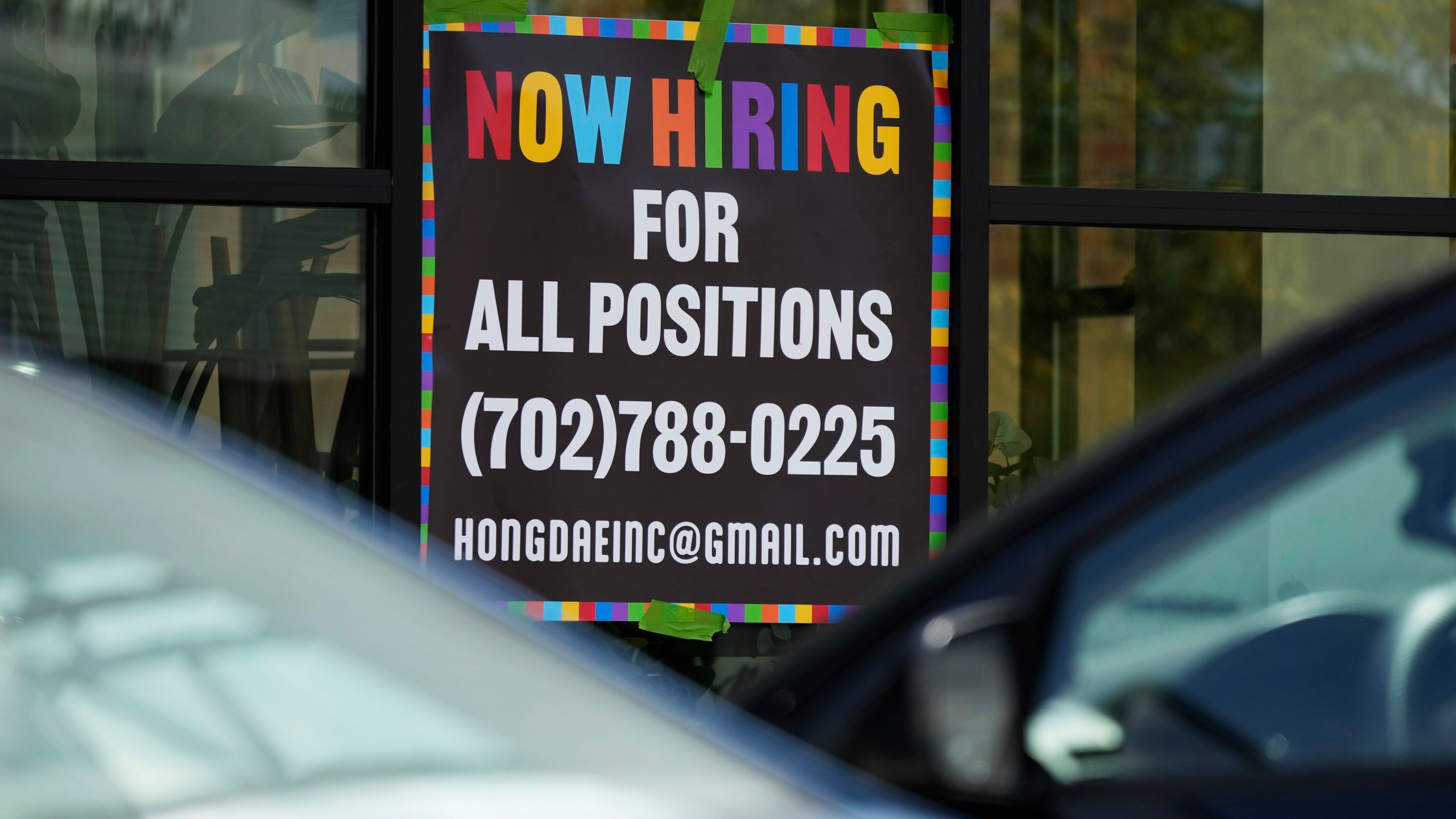FILE - A hiring sign is displayed at a restaurant in Mount Prospect, Ill., Aug. 27, 2024. (AP Photo/Nam Y. Huh, file)