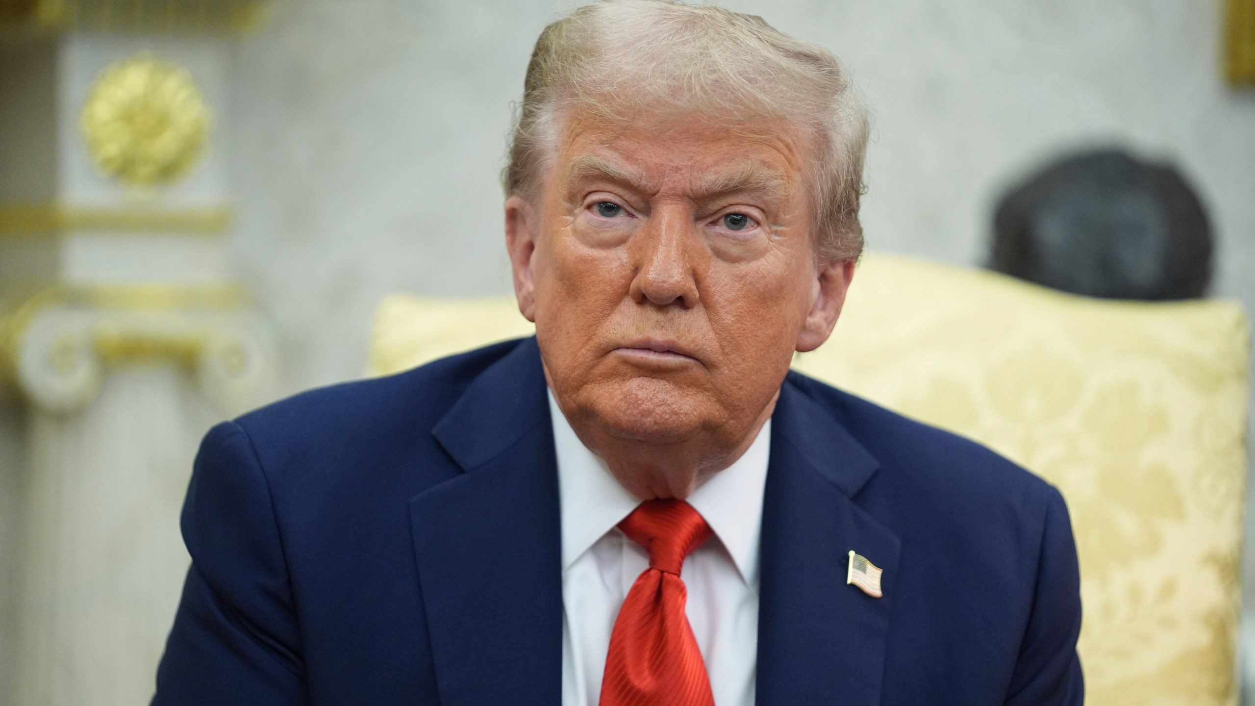 President Donald Trump listens during a meeting with Polish President Karol Nawrocki in the Oval Office of the White House, Wednesday, Sept. 3, 2025, in Washington. (AP Photo/Evan Vucci)