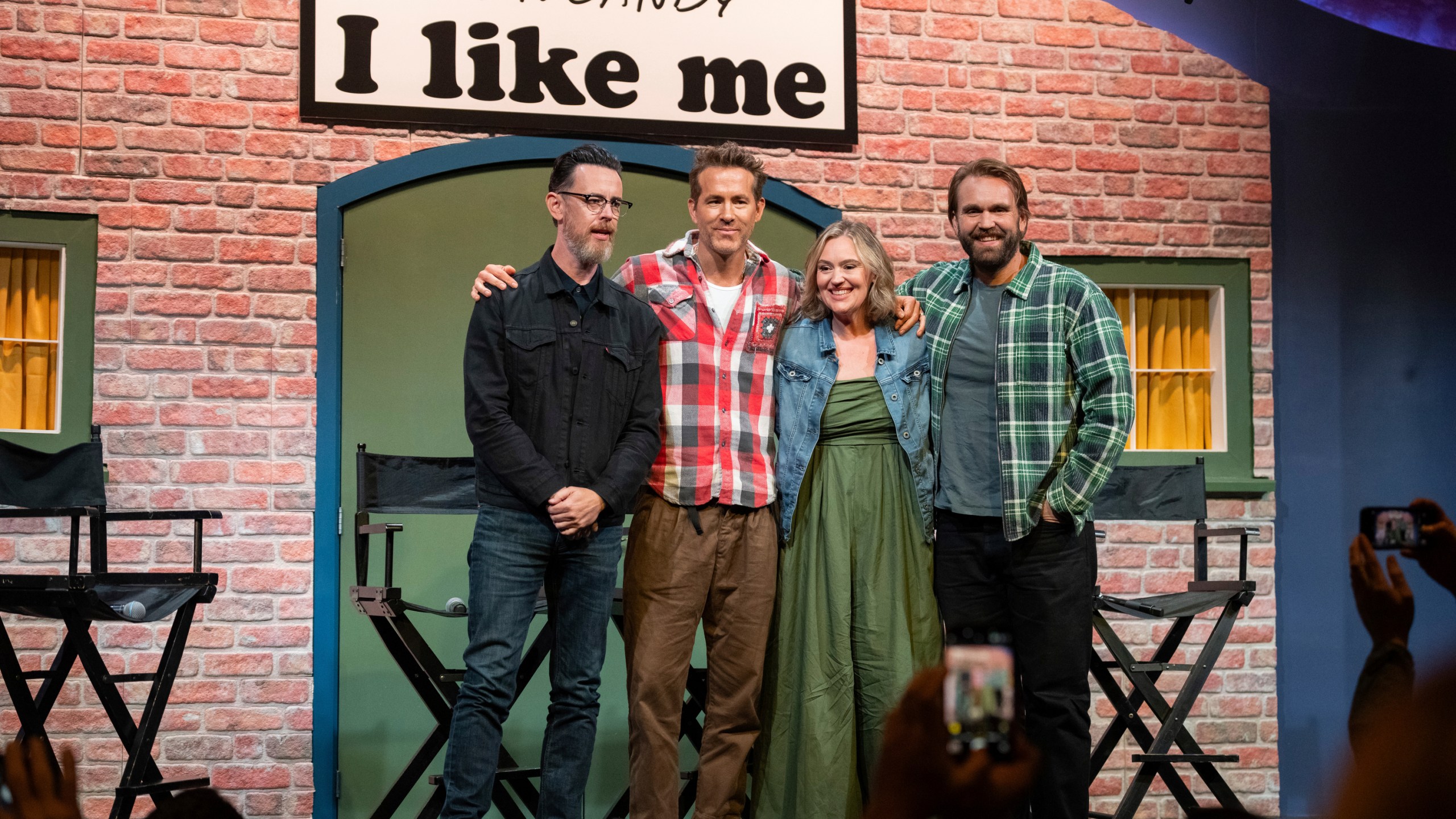 Director Colin Hanks, producer Ryan Reynolds, and John Candy's children Jennifer and Christopher Candy pose for a photo at a press conference for the film John Candy: I Like Me, prior to the film's premiere, at the Toronto International Film Festival, in Toronto on Thursday, September 4, 2025. (Arlyn McAdorey/The Canadian Press via AP)