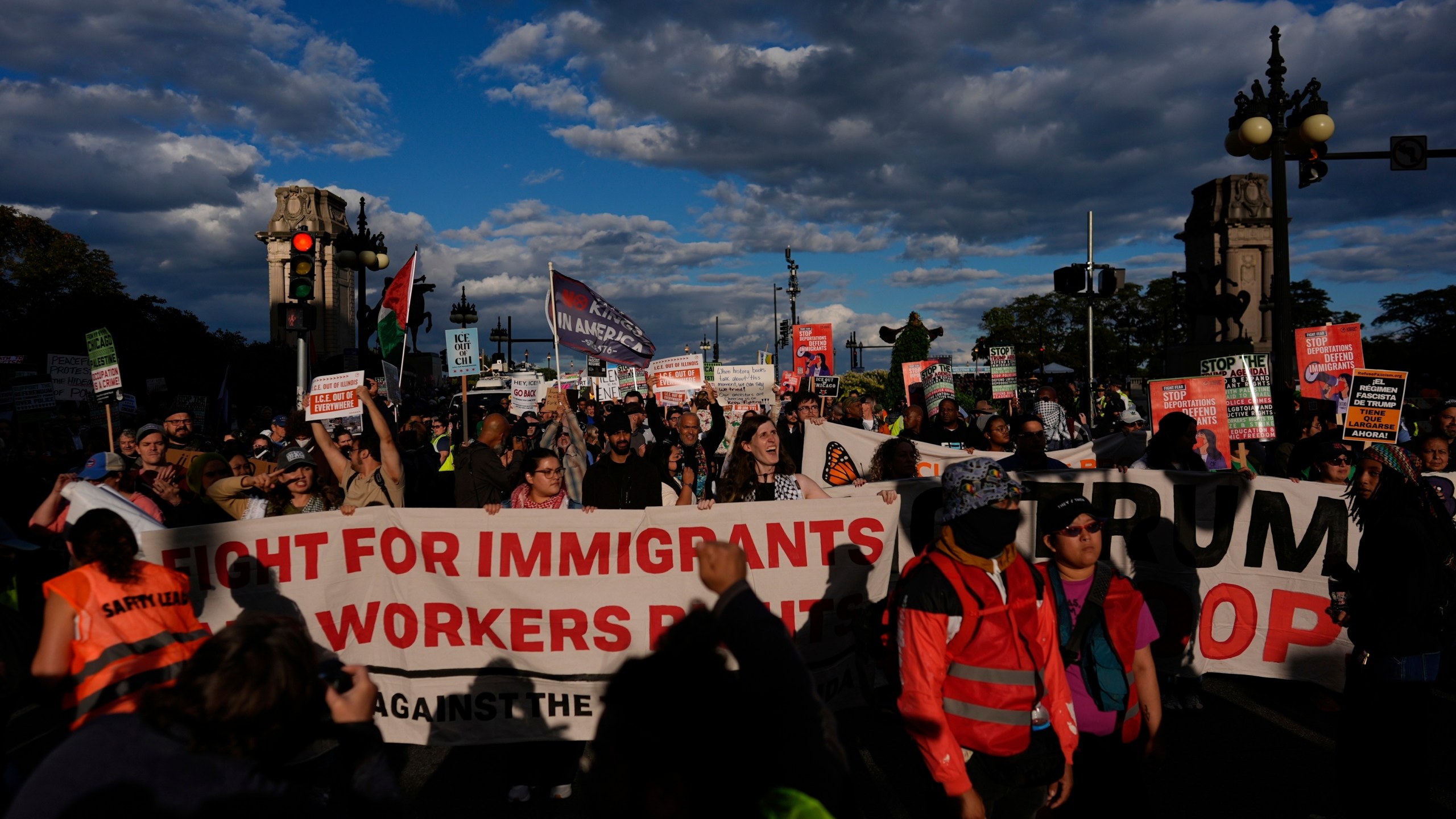 People march during Illinois Coalition for Immigrant & Refugee Rights' "Chicago Says No Trump No Troops" protest Saturday, Sept. 6, 2025, in Chicago. (AP Photo/Carolyn Kaster)