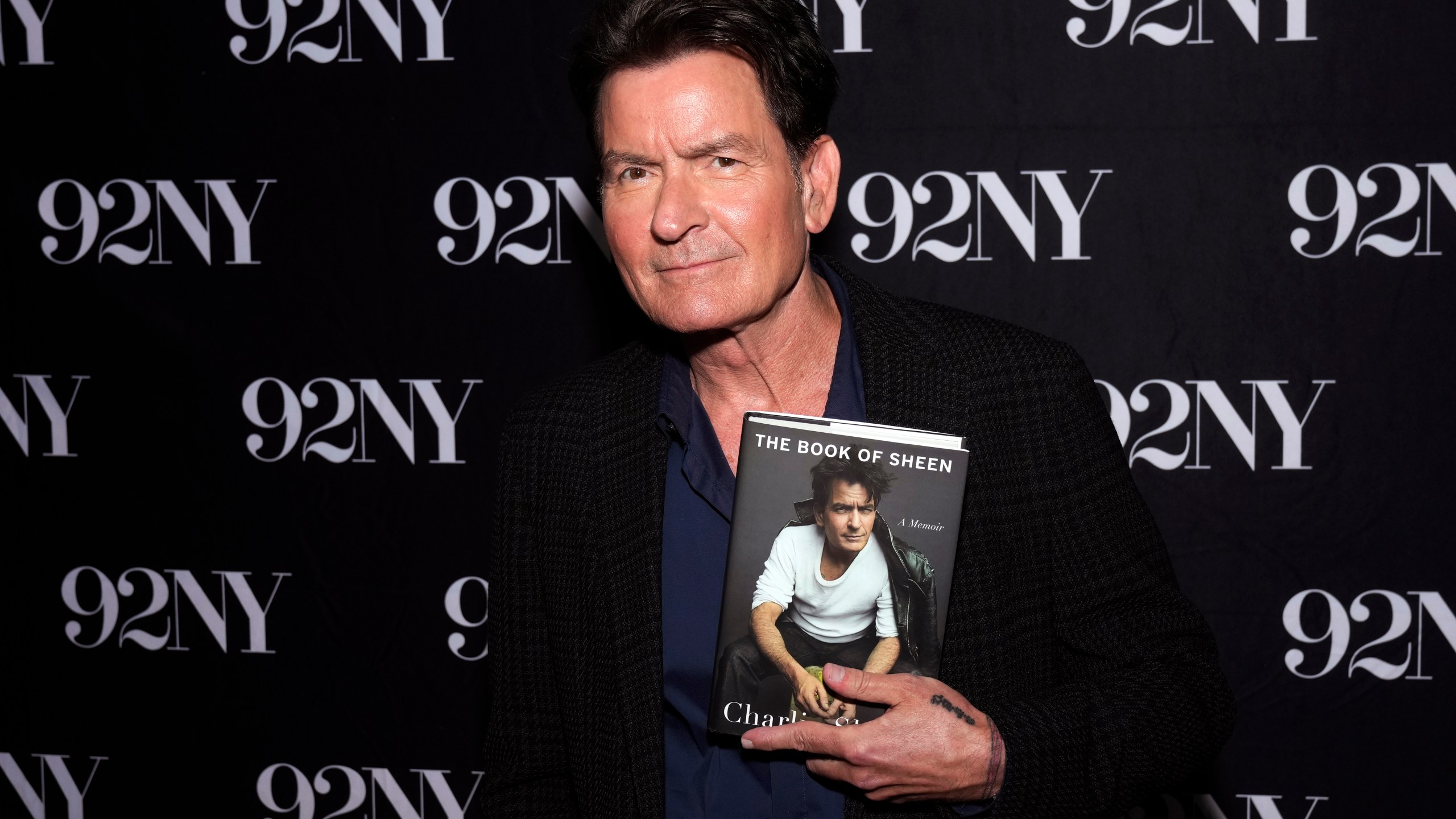 Charlie Sheen poses backstage before discussing his book "The Book of Sheen" at the 92nd Street Y on Monday, Sept. 8, 2025, in New York. (Photo by Charles Sykes/Invision/AP)