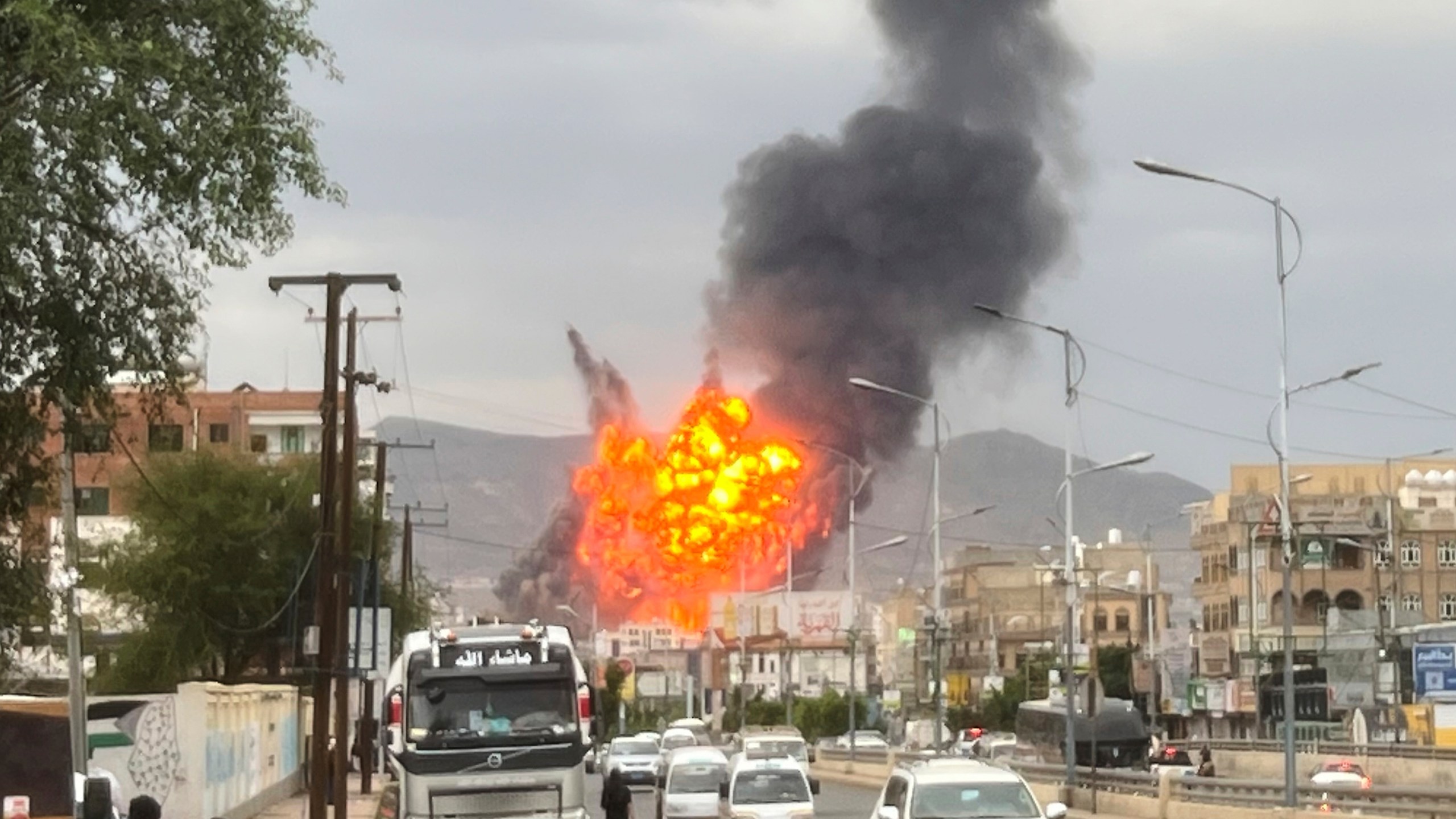 Flames and smoke rise in Sanaa, Yemen