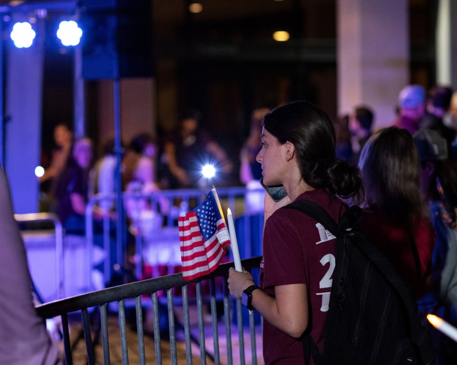 People gather prior to a vigil for Charlie Kirk at Rudder Plaza on the Texas A&M Campus in College Station, Texas on Thursday, Sept. 11, 2025. (Meredith Seaver/College Station Eagle via AP)