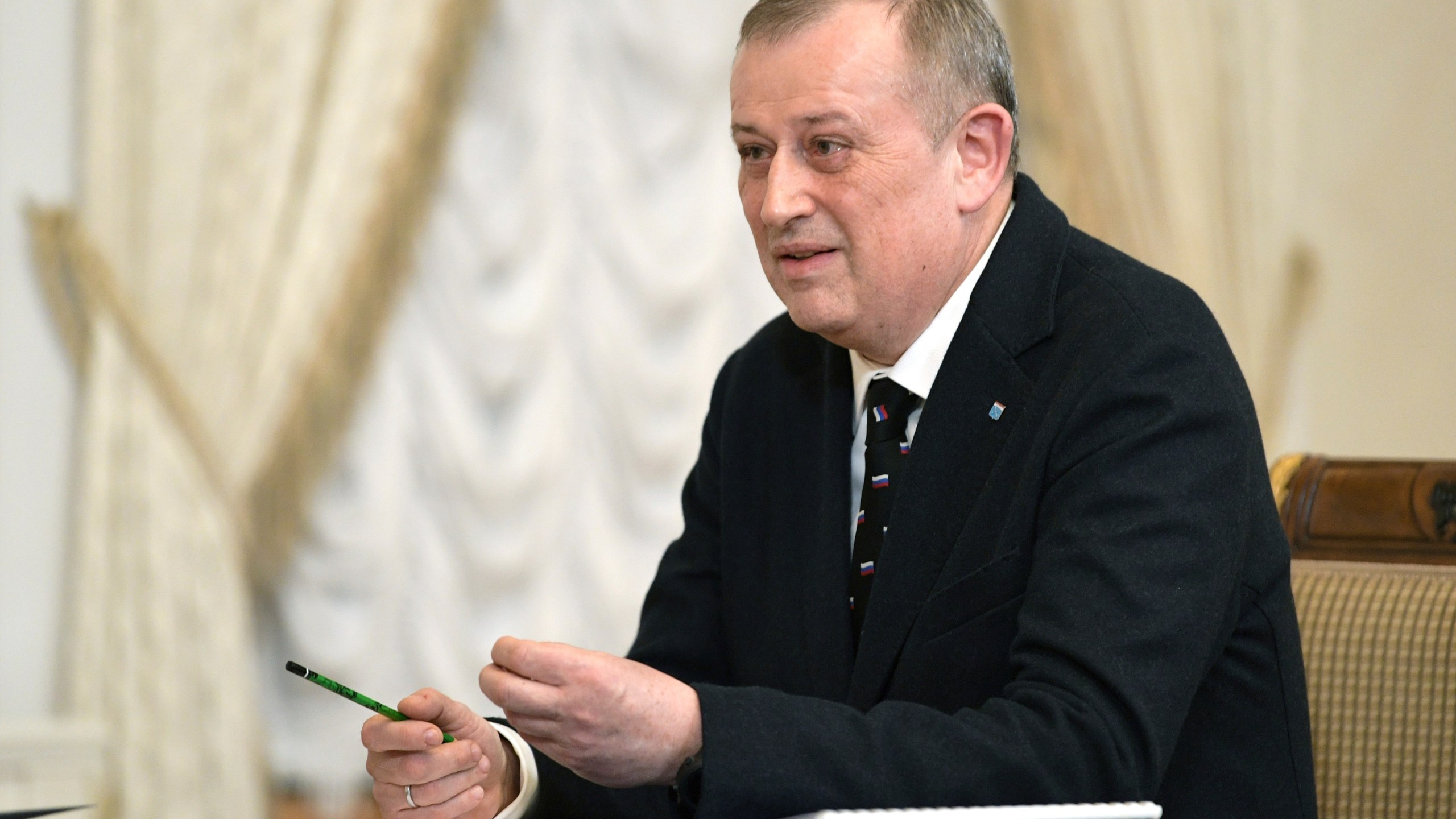 FILE - Leningrad Region Governor Alexander Drozdenko speaks to Russian President Vladimir Putin during their meeting in St. Petersburg, Russia, Monday, Jan. 29, 2024. (Alexei Danichev, Sputnik, Kremlin Pool Photo via AP, File)