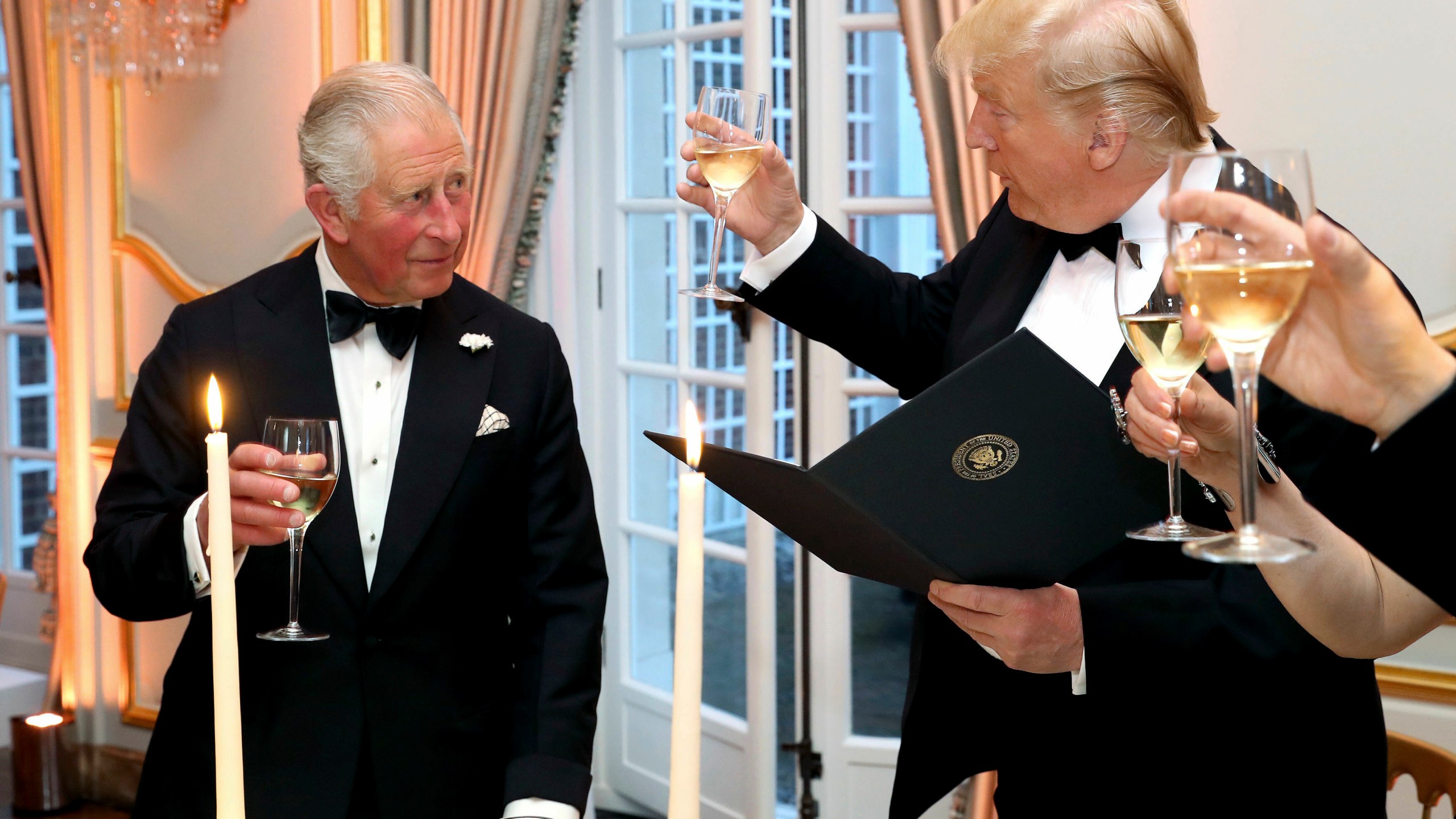 FILE - U.S. President Donald Trump and Britain's Prince Charles toast, during the Return Dinner in Winfield House, the residence of the Ambassador of the United States of America to the UK, in Regent's Park, part of the president's state visit to the UK, in London, Tuesday, June 4, 2019. (Chris Jackson/Pool Photo via AP, File)