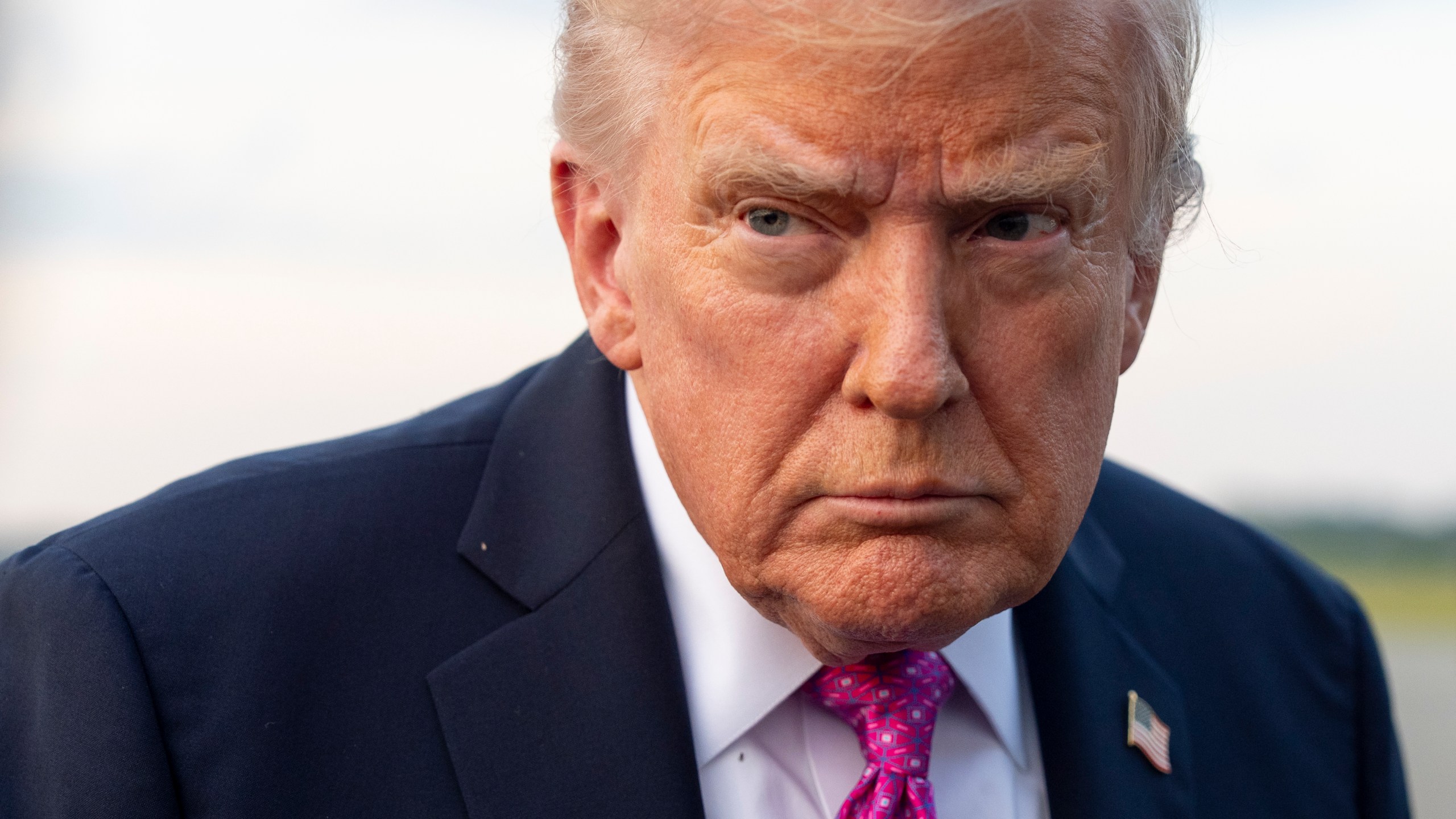 President Donald Trump speaks with reporters before he departs on Air Force One at Morristown Airport, Sunday, Sept. 14, 2025, in Morristown, N.J. (AP Photo/Alex Brandon)