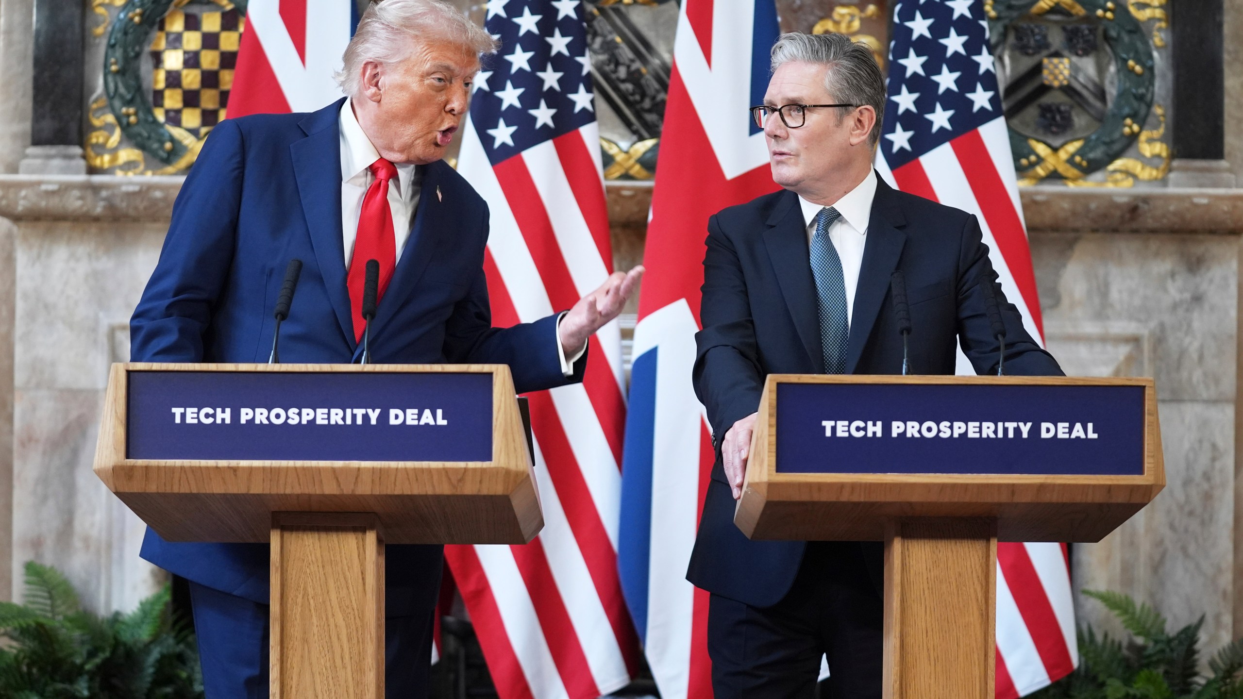 President Donald Trump gestures next to Britain's Prime Minister Keir Starmer during a joint press conference at Chequers near Aylesbury, England, Thursday, Sept. 18, 2025. (AP Photo/Evan Vucci)