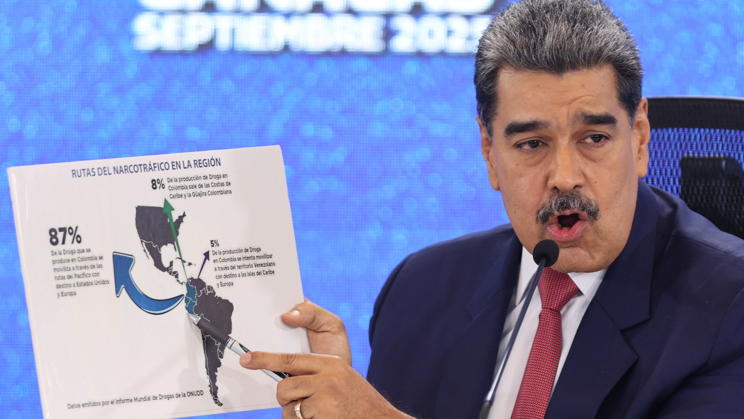 Venezuelan President Nicolas Maduro points at a map of the Americas during a press conference in Caracas, Venezuela, Monday, Sept 15, 2025. (AP Photo/Jesus Vargas)