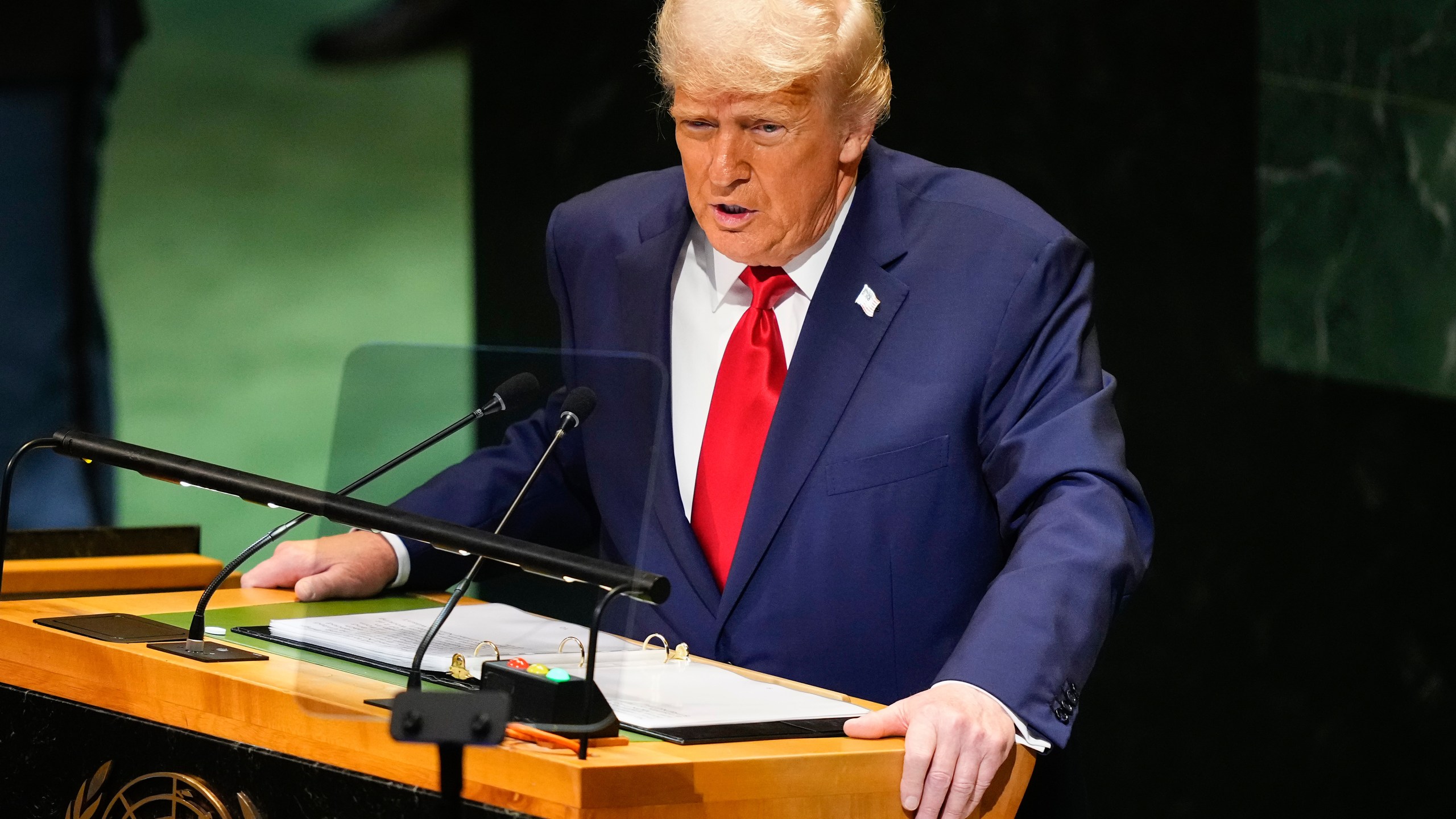 President Donald Trump speaking onstage