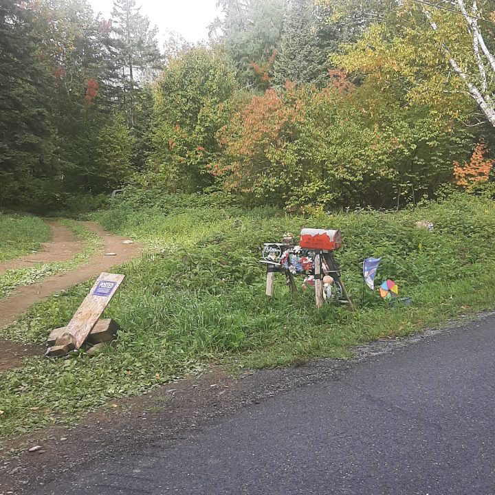 A memorial on a driveway.