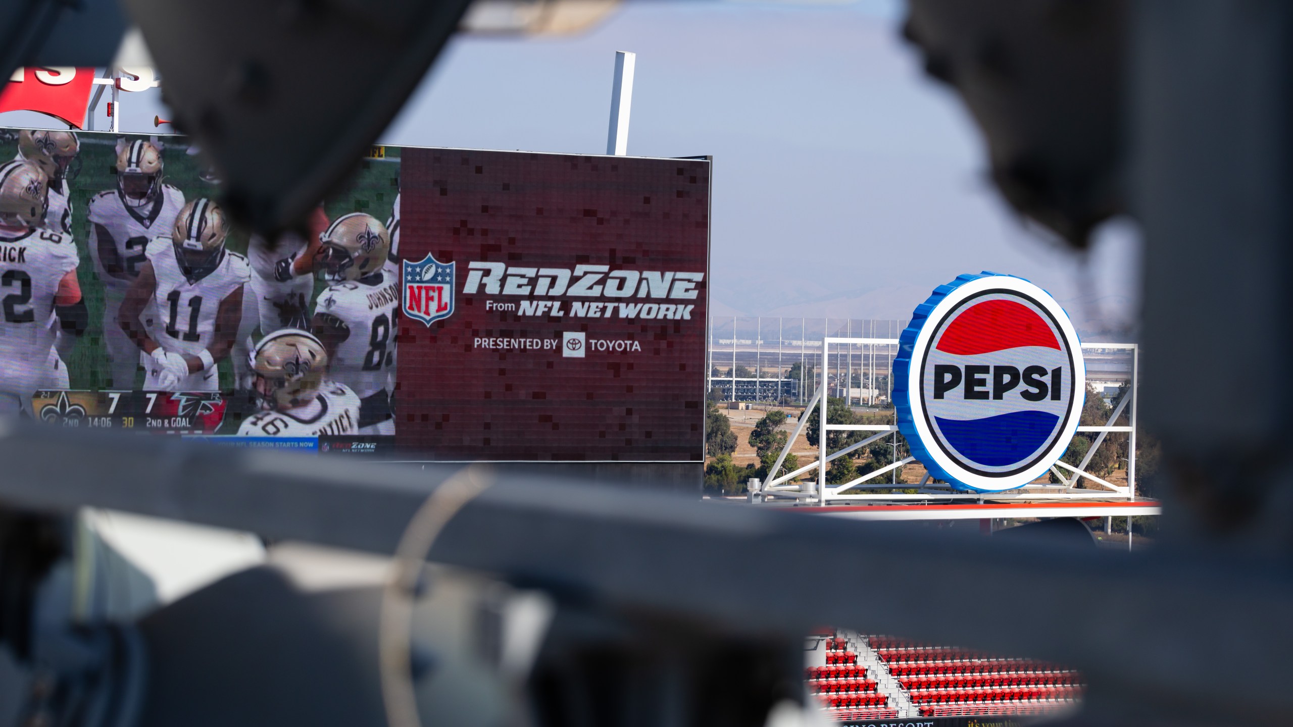 A Pepsi sign with NFL Red Zone on the screen before the NFL game between the New England Patriots and the San Francisco 49ers on September 29, 2024 at Levi's Stadium in Santa Clara, CA.