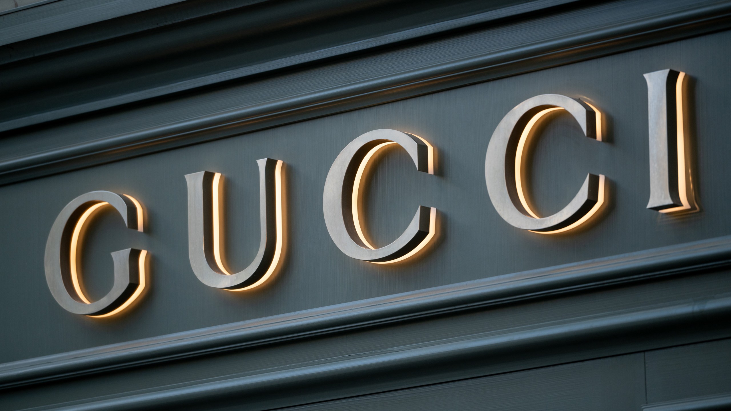A logo above a Gucci luxury boutique in Paris, France, on Tuesday, Oct. 22, 2024. One of Kering SA's longest-standing bulls has thrown in the towel, dealing another blow to the Gucci-owner just days ahead of a sales update.