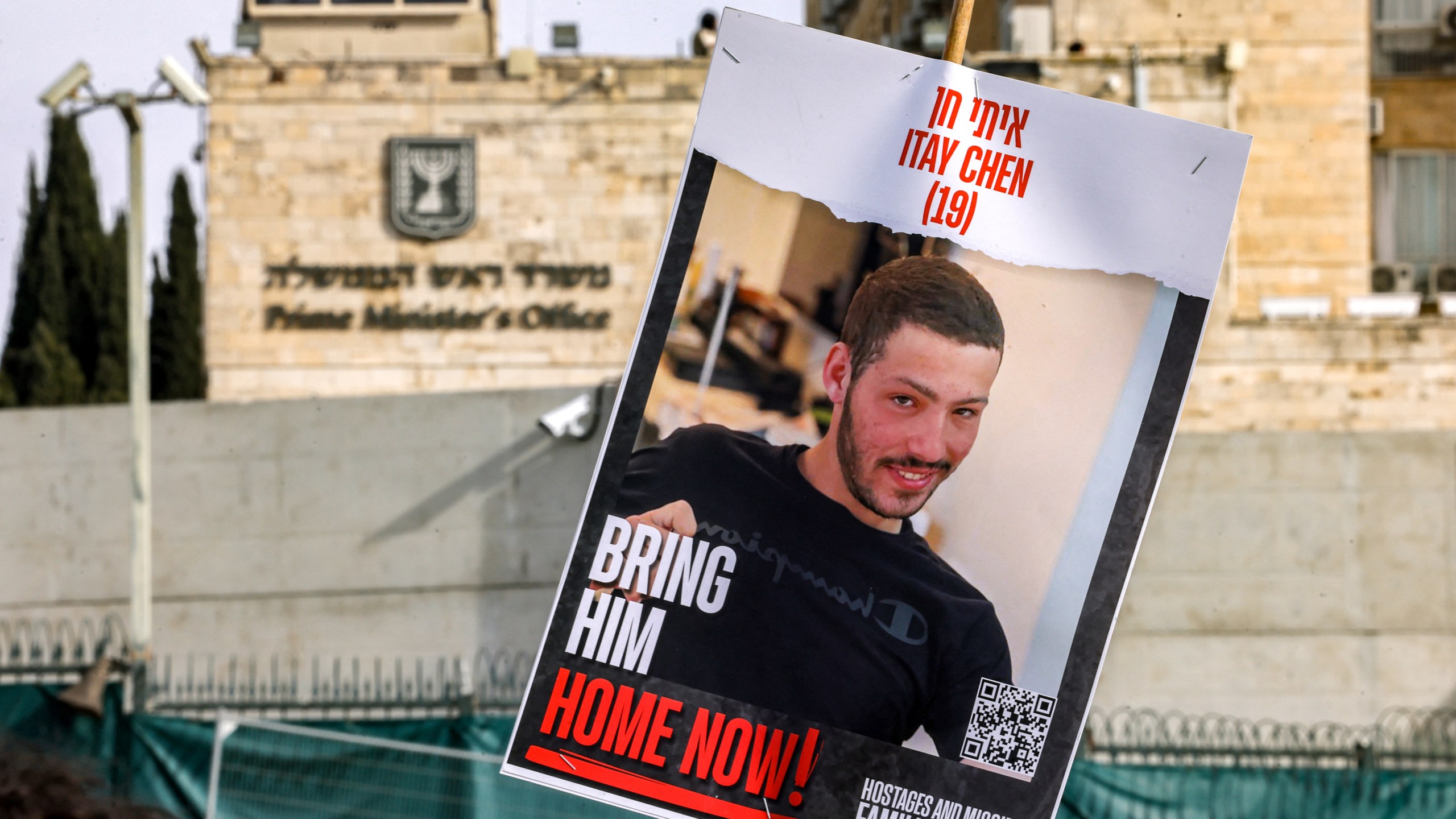 Sign with picture of Itay Chen