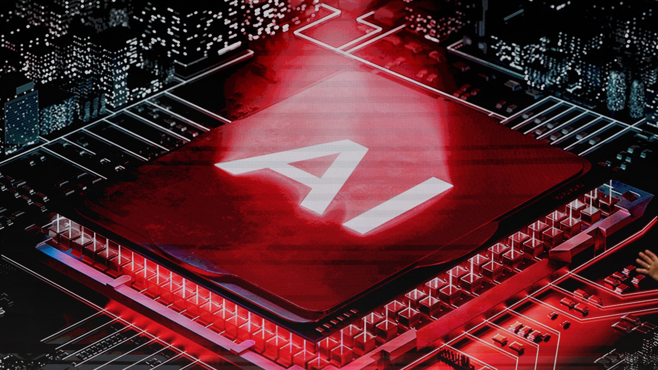 A screen displays an artificial intelligence (AI) processor during Keynote 1 at the MWC (Mobile World Congress)