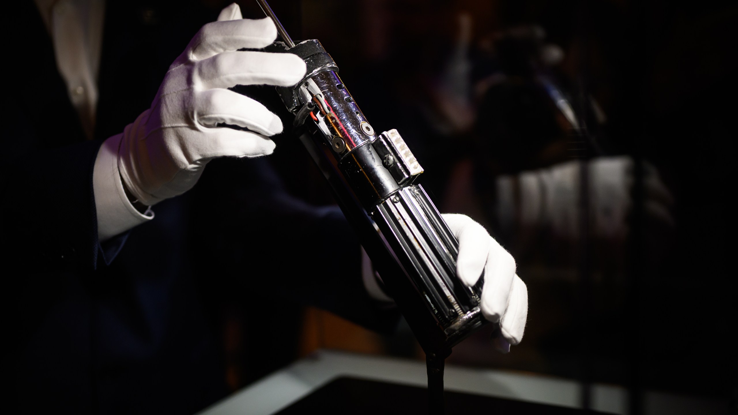 The screen-matched lightsaber prop, used by the character "Darth Vader" in the Star Wars films "The Empire Strikes Back and "Return Of The Jedi"